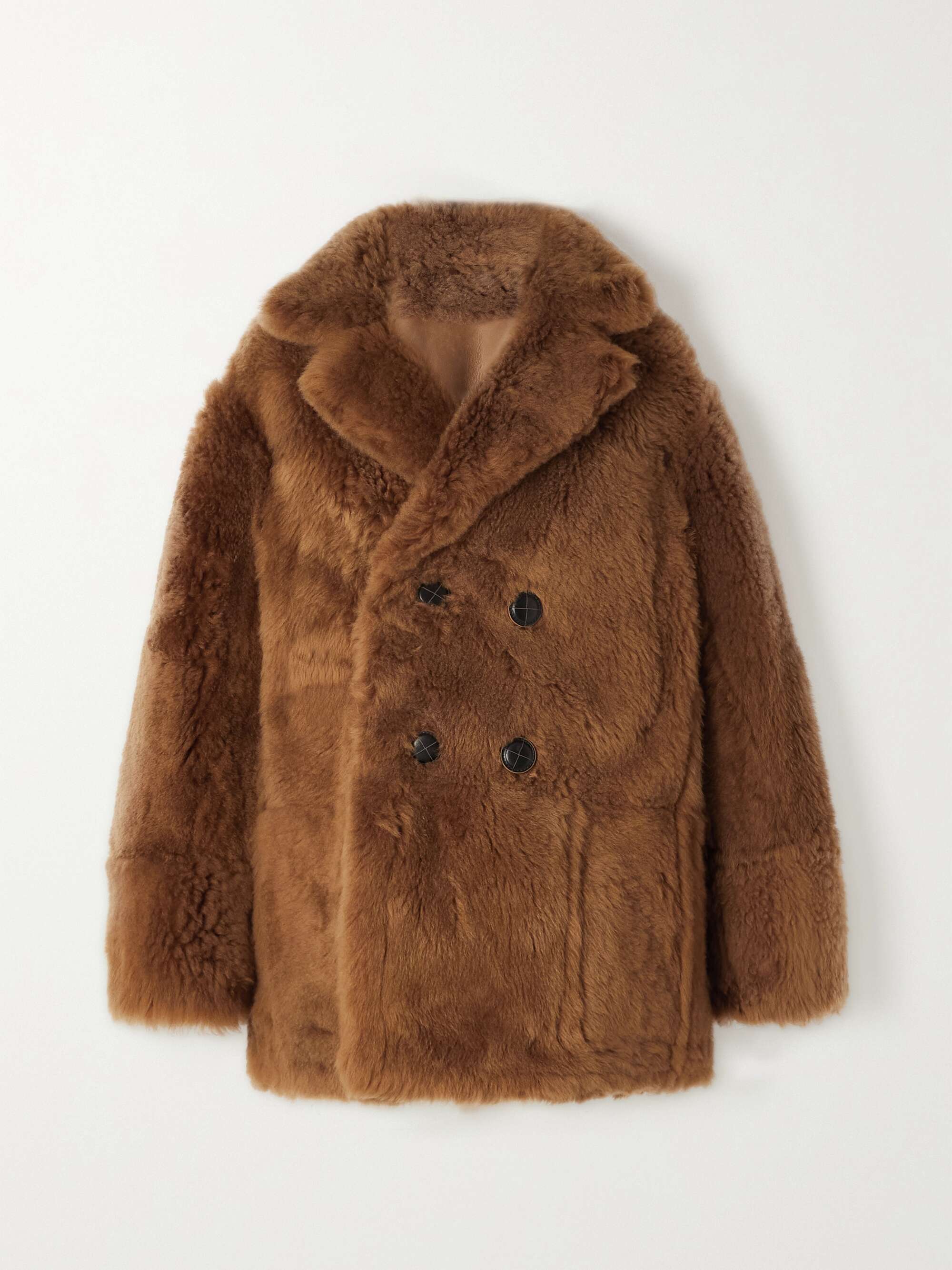Double-breasted reversible shearling and leather coat view