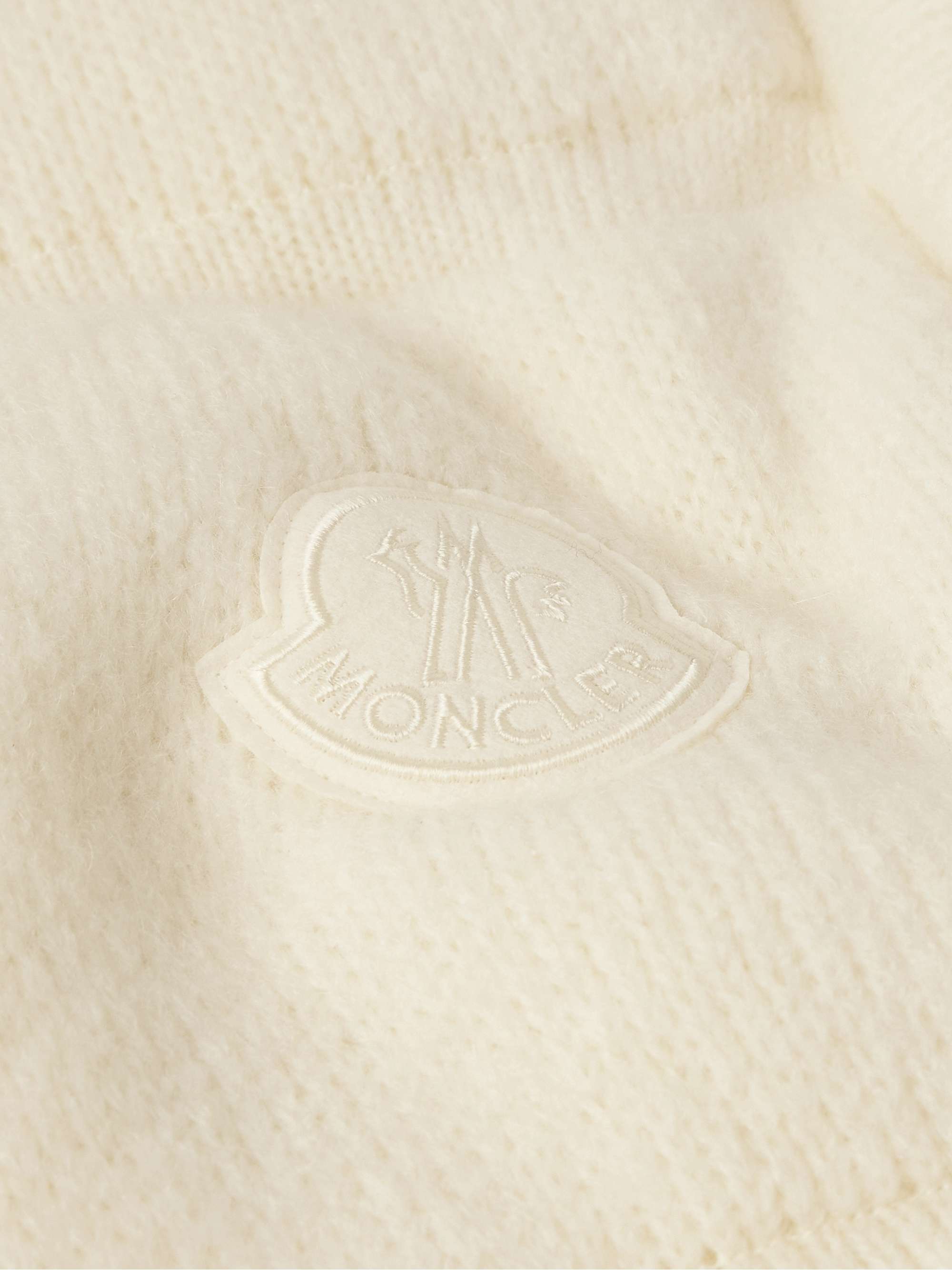 Logo-Appliquéd Quilted Knitted Down Jacket view