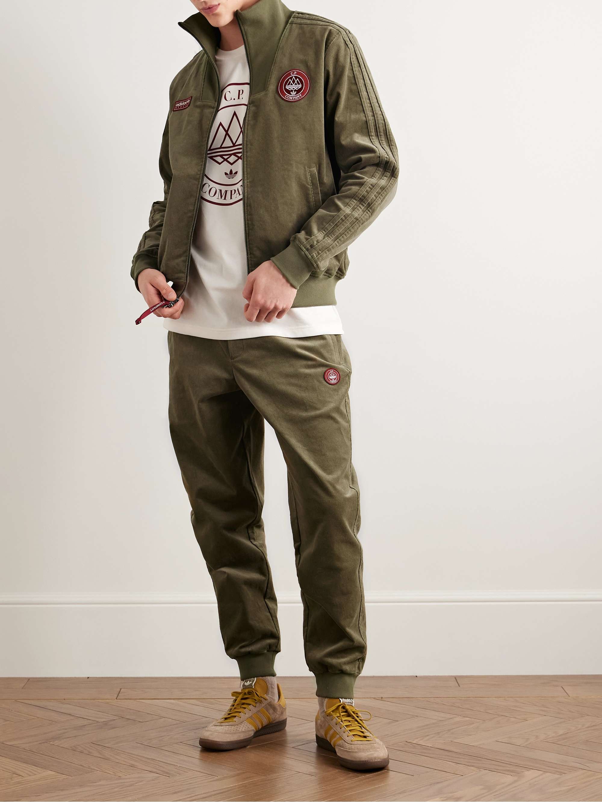 + C.P. Company Spezial Settend Tapered Logo-Appliquéd Cotton-Blend Corduroy Track Pants view