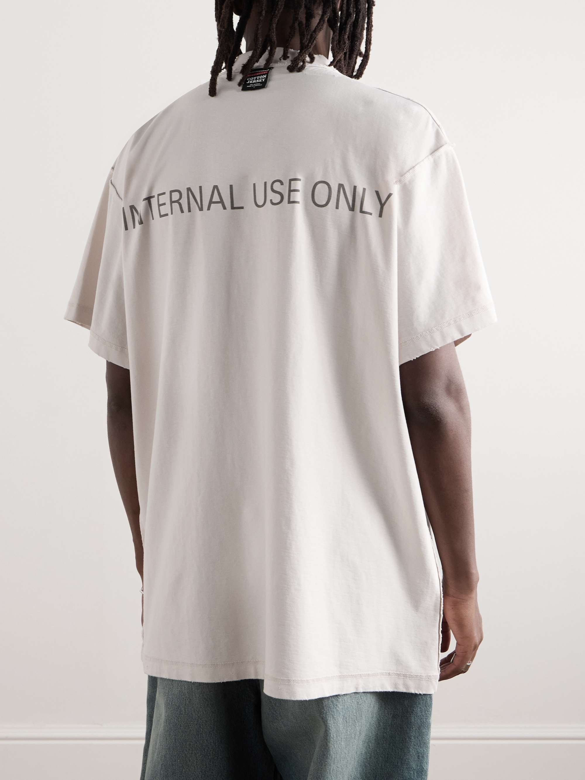Inside Out Oversized Distressed Logo-Print Cotton-Jersey T-Shirt view