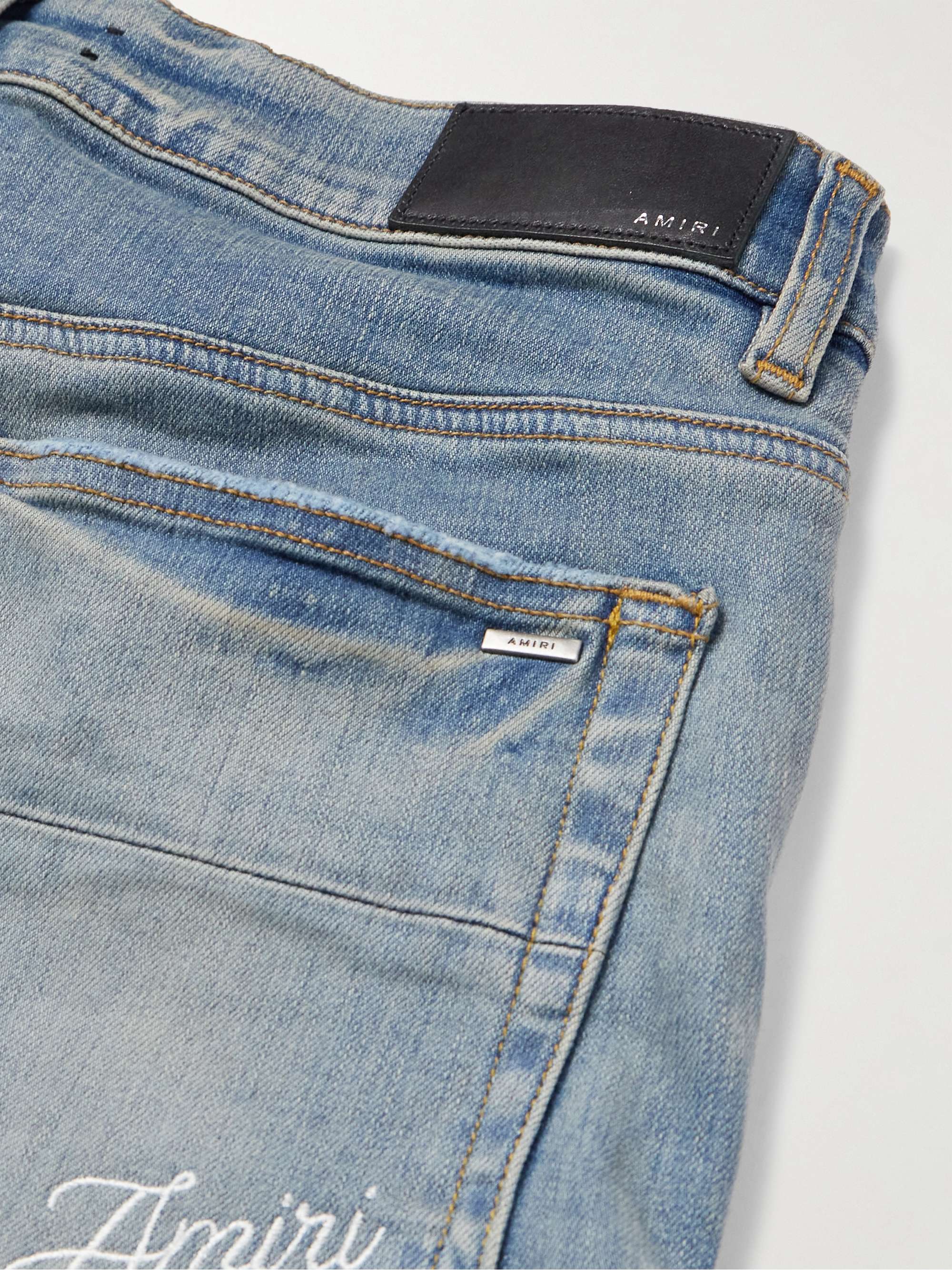 3D Bones Skinny-Fit Distressed Appliquéd Jeans view