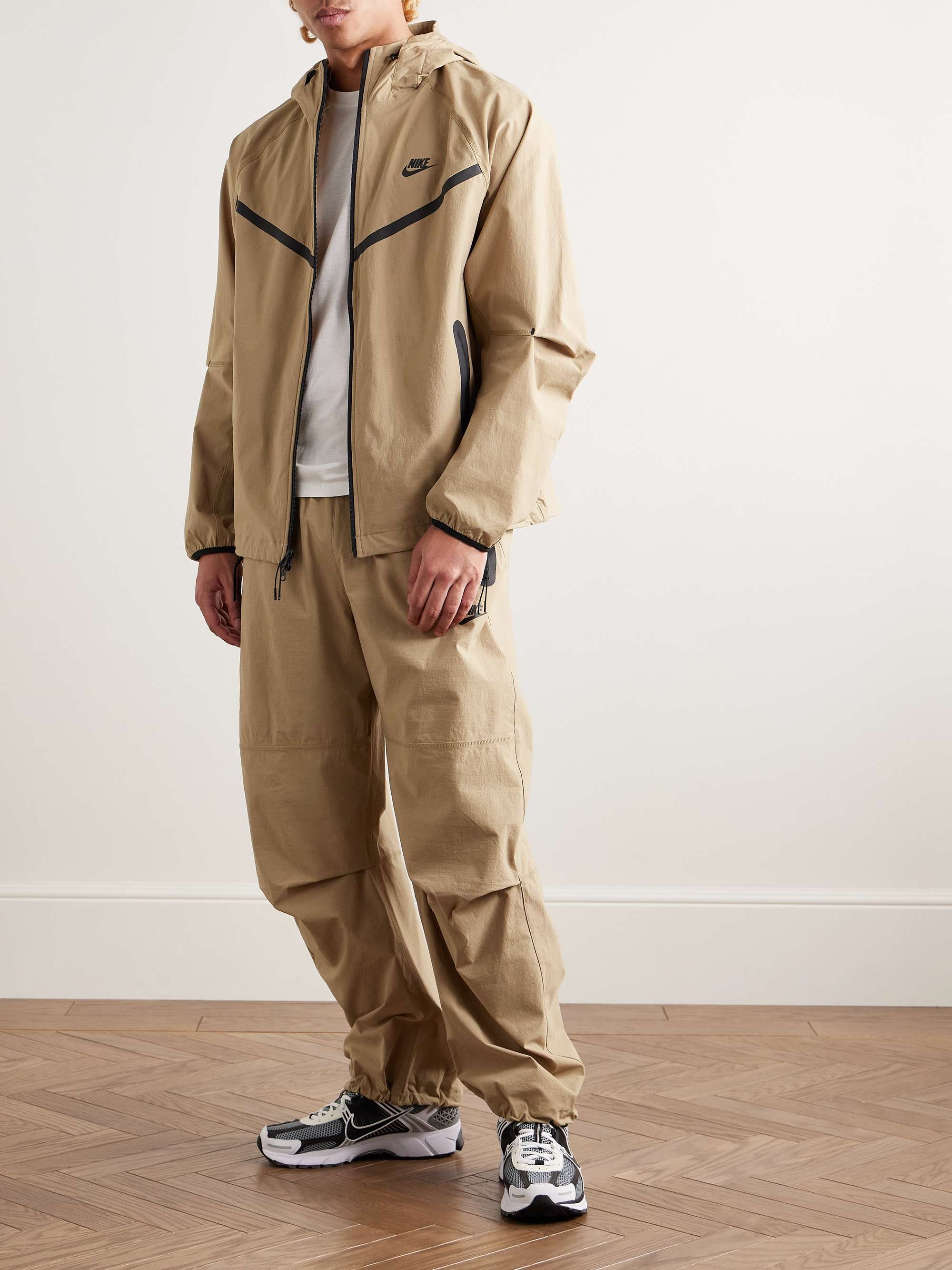 Tech Wide-Leg Pleated Logo-Print Stretch-Nylon Trousers view