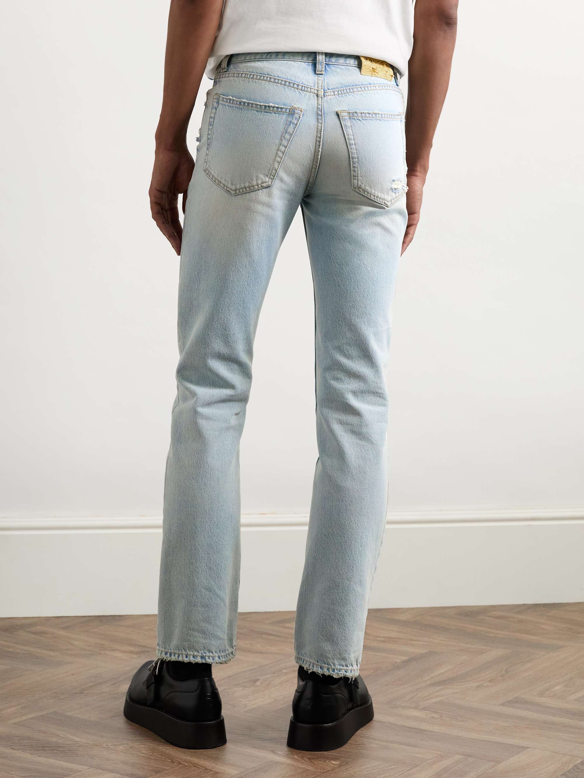 Slim-Fit Distressed Jeans view