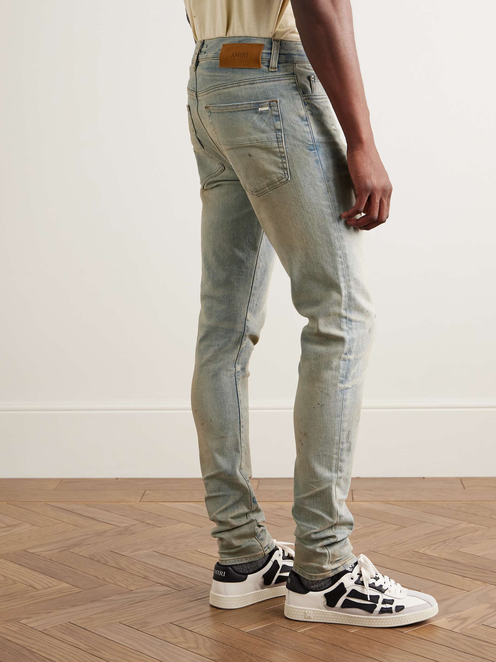 Stack Skinny-Fit Distressed Jeans view