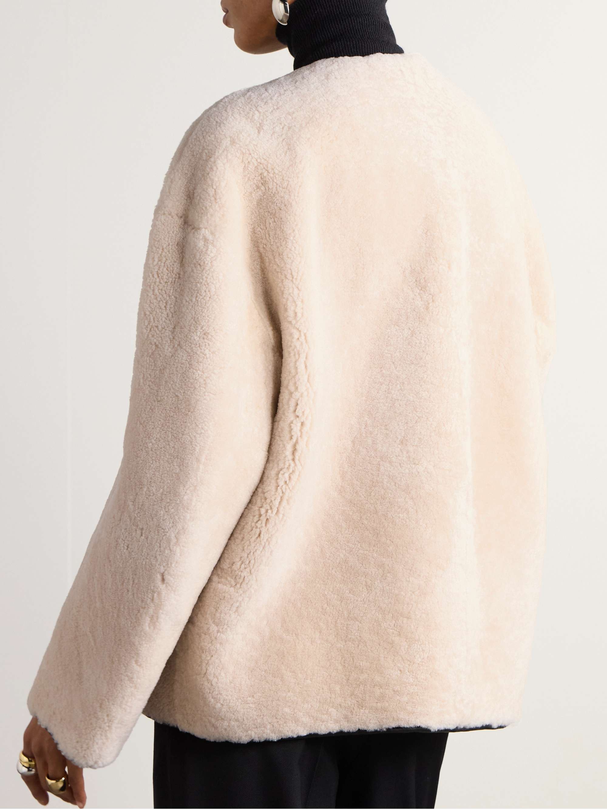Leather-trimmed shearling jacket view