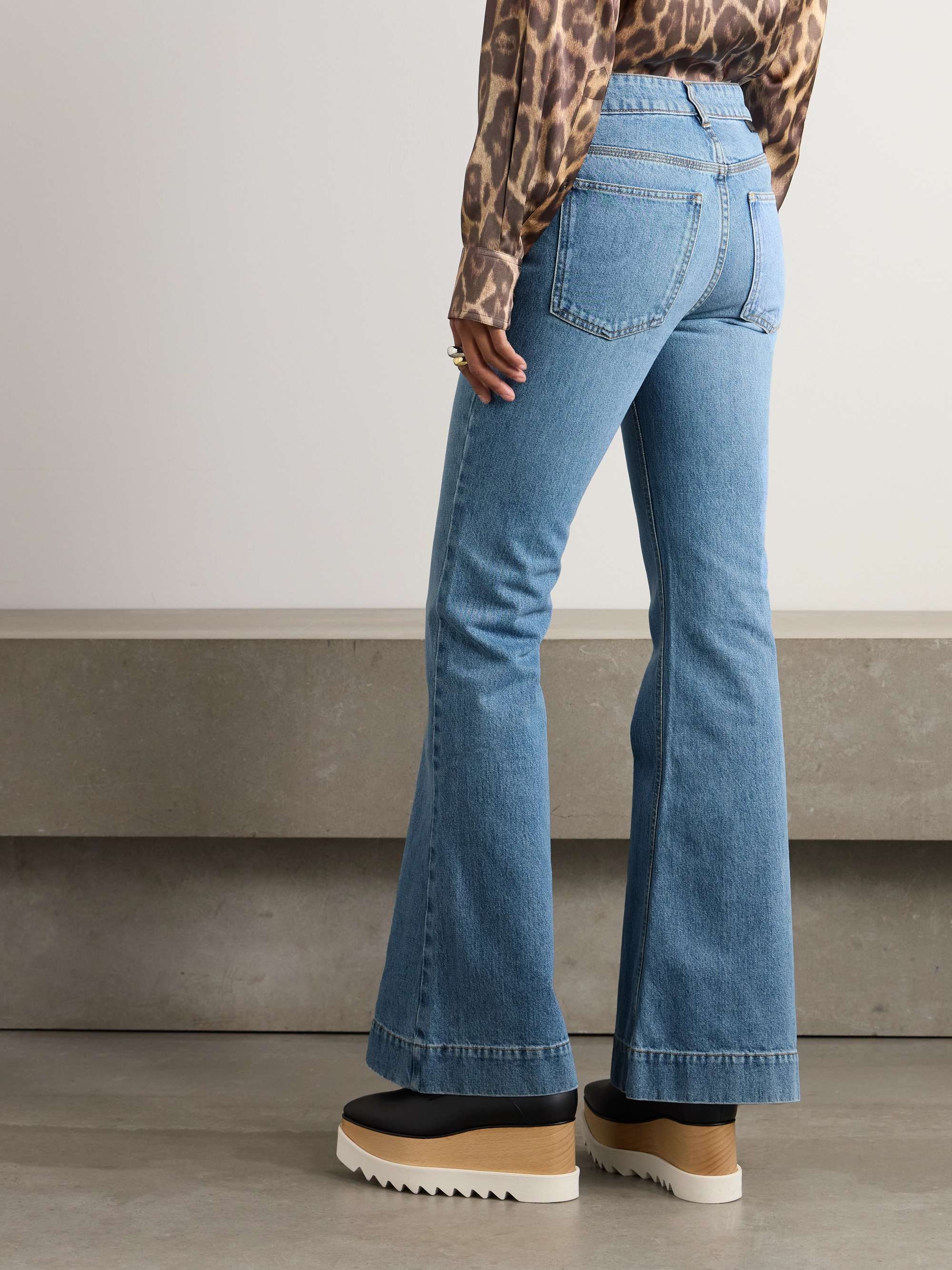 + NET SUSTAIN Iconic chain-embellished high-rise flared jeans view