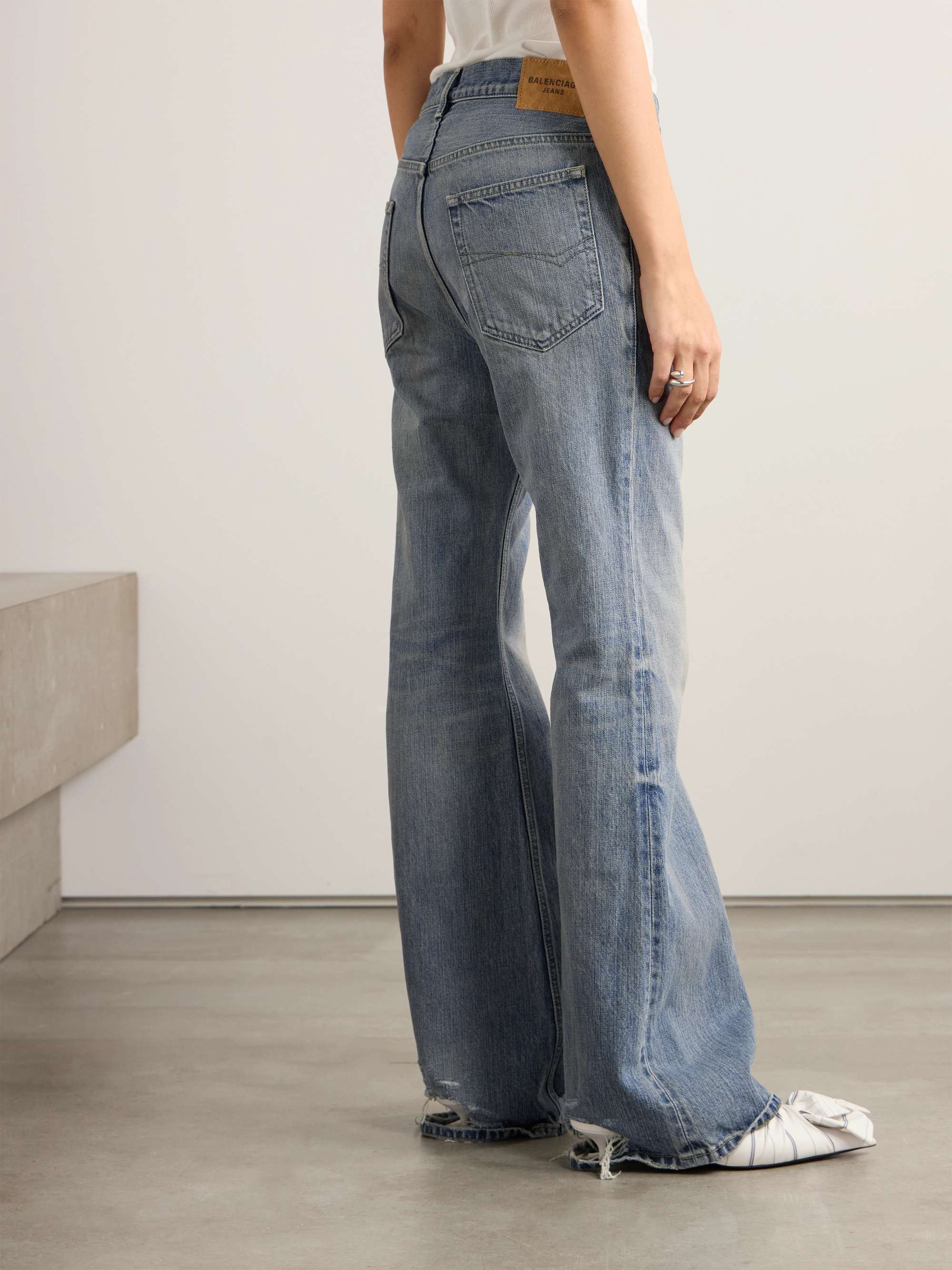 Low-rise flared jeans view