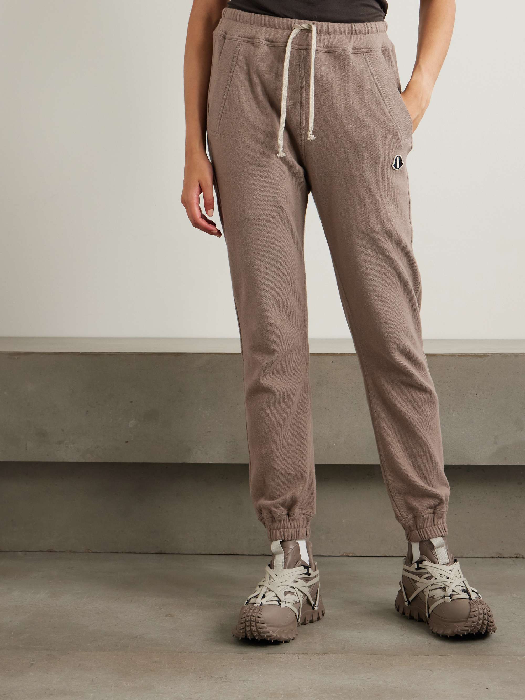 + Moncler appliquéd cotton-jersey track pants view