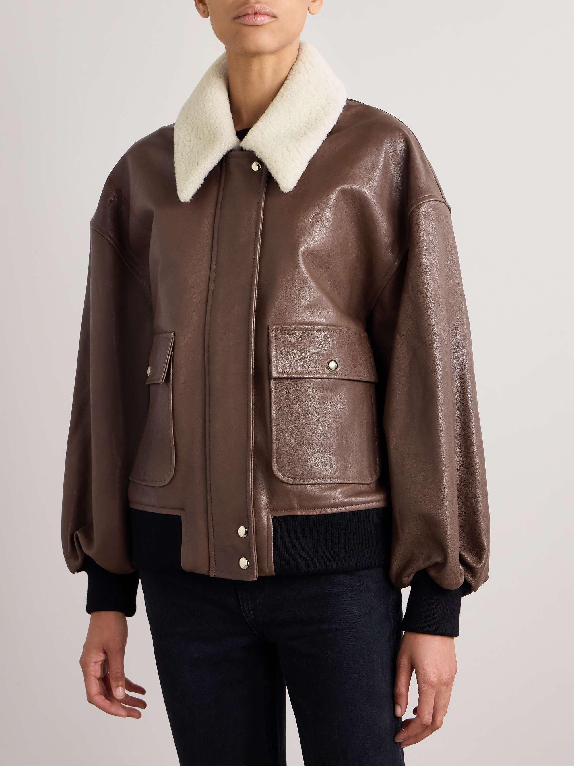 Shellar oversized shearling-trimmed leather jacket view