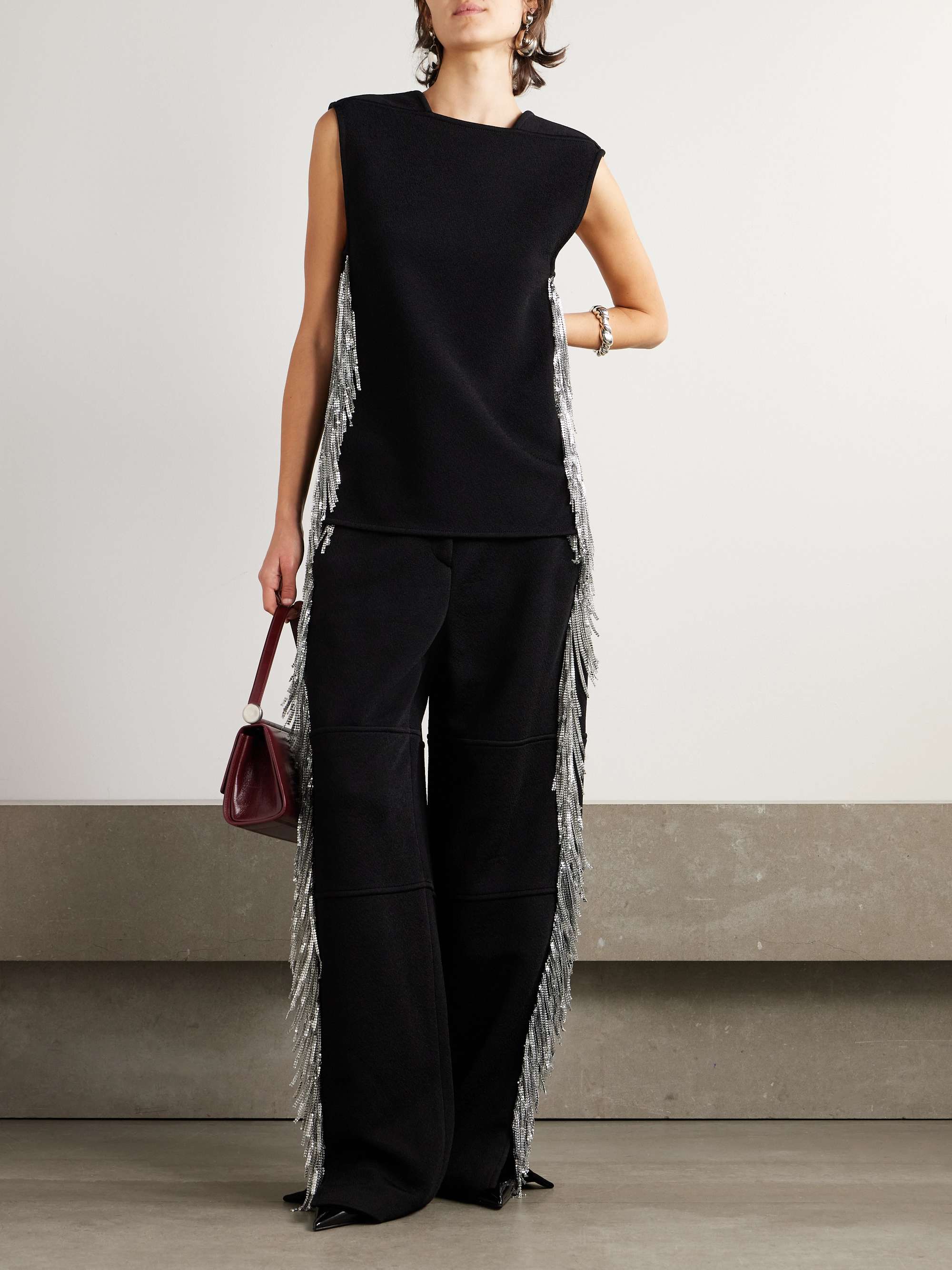 Fringed open-back embellished ponte top view