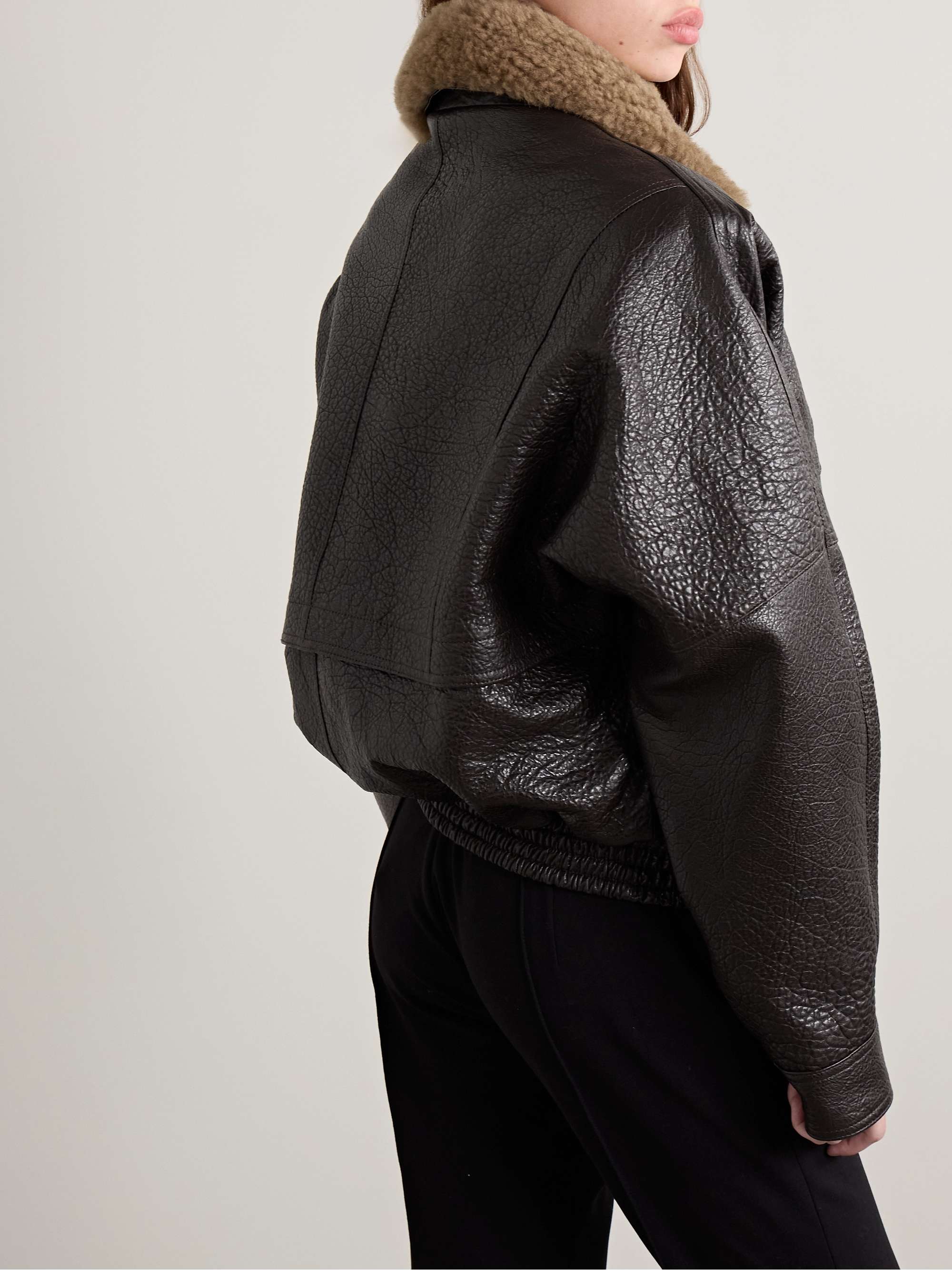 Shearling-trimmed textured-leather jacket view