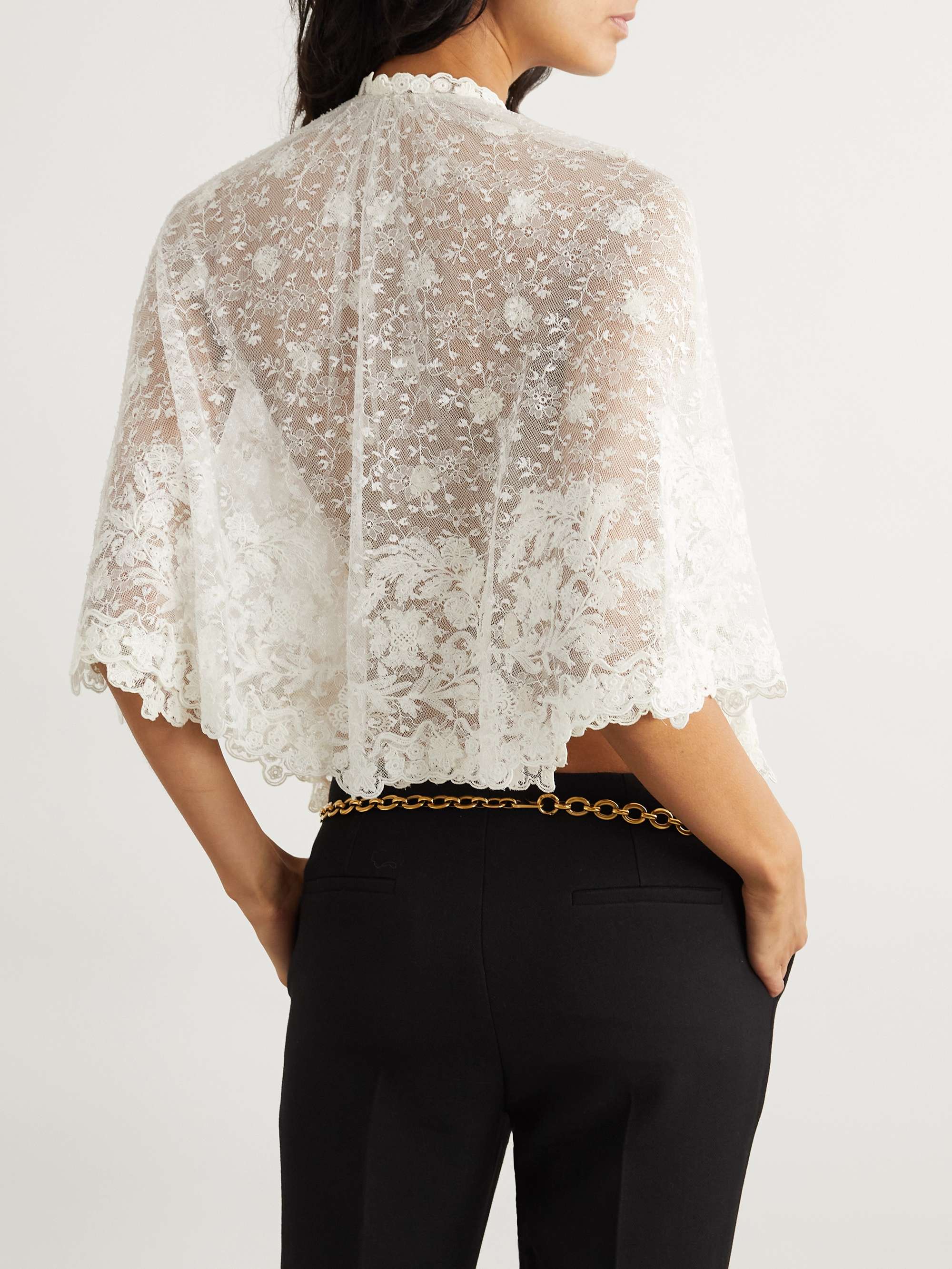 Cape-effect knotted lace blouse view