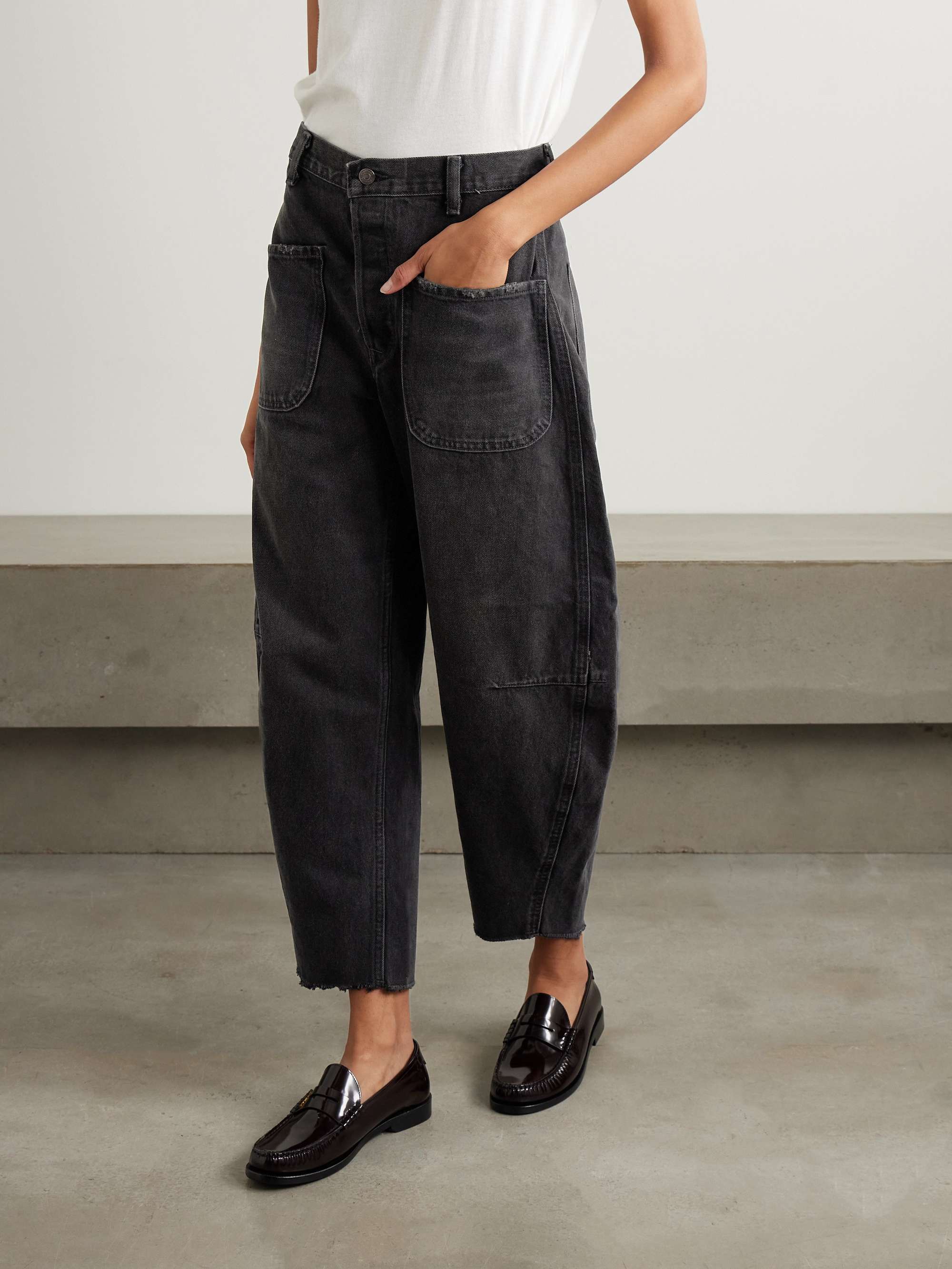Frayed high-rise tapered jeans view