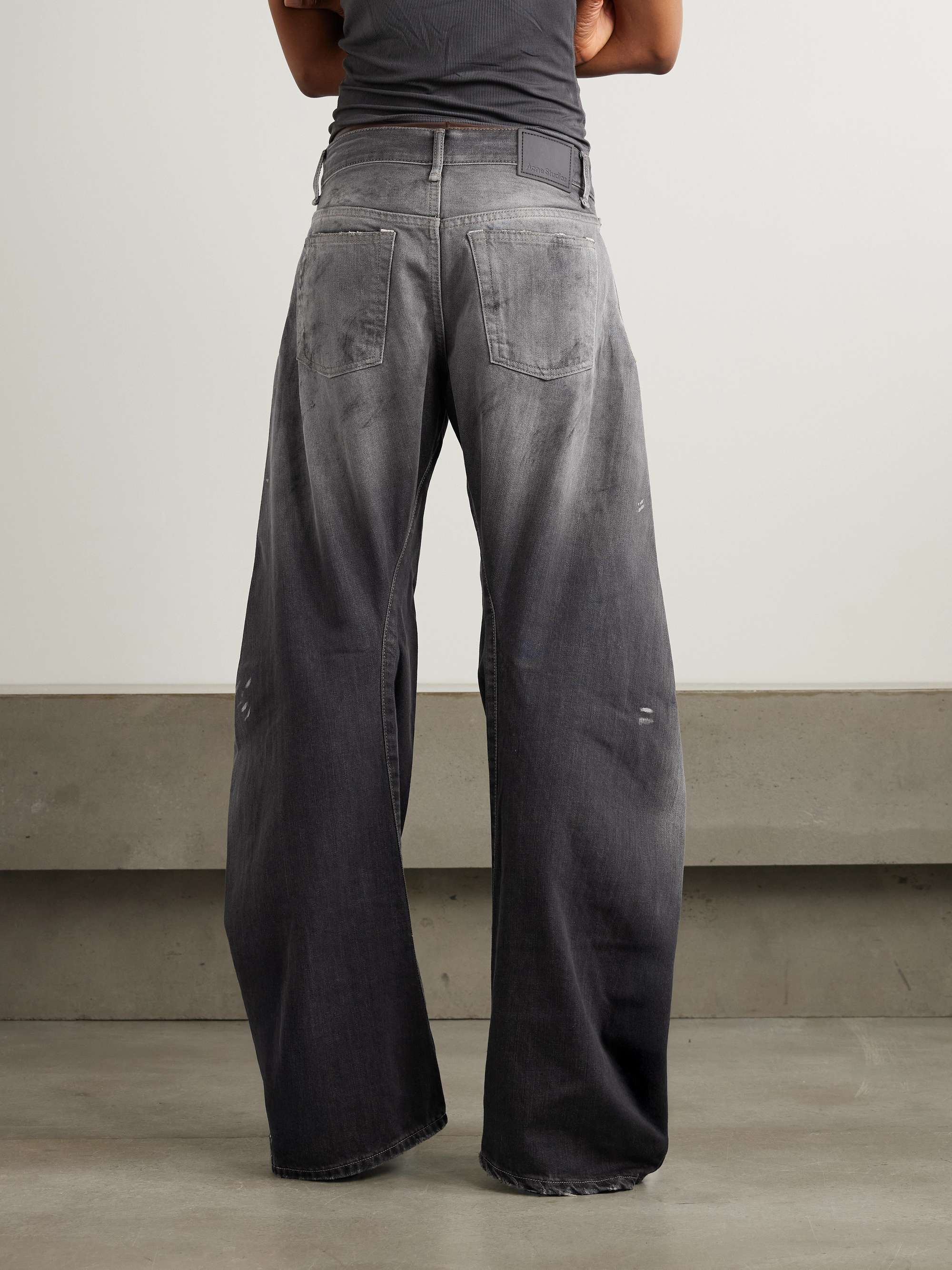 2006 paint-splattered low-rise barrel-leg jeans view