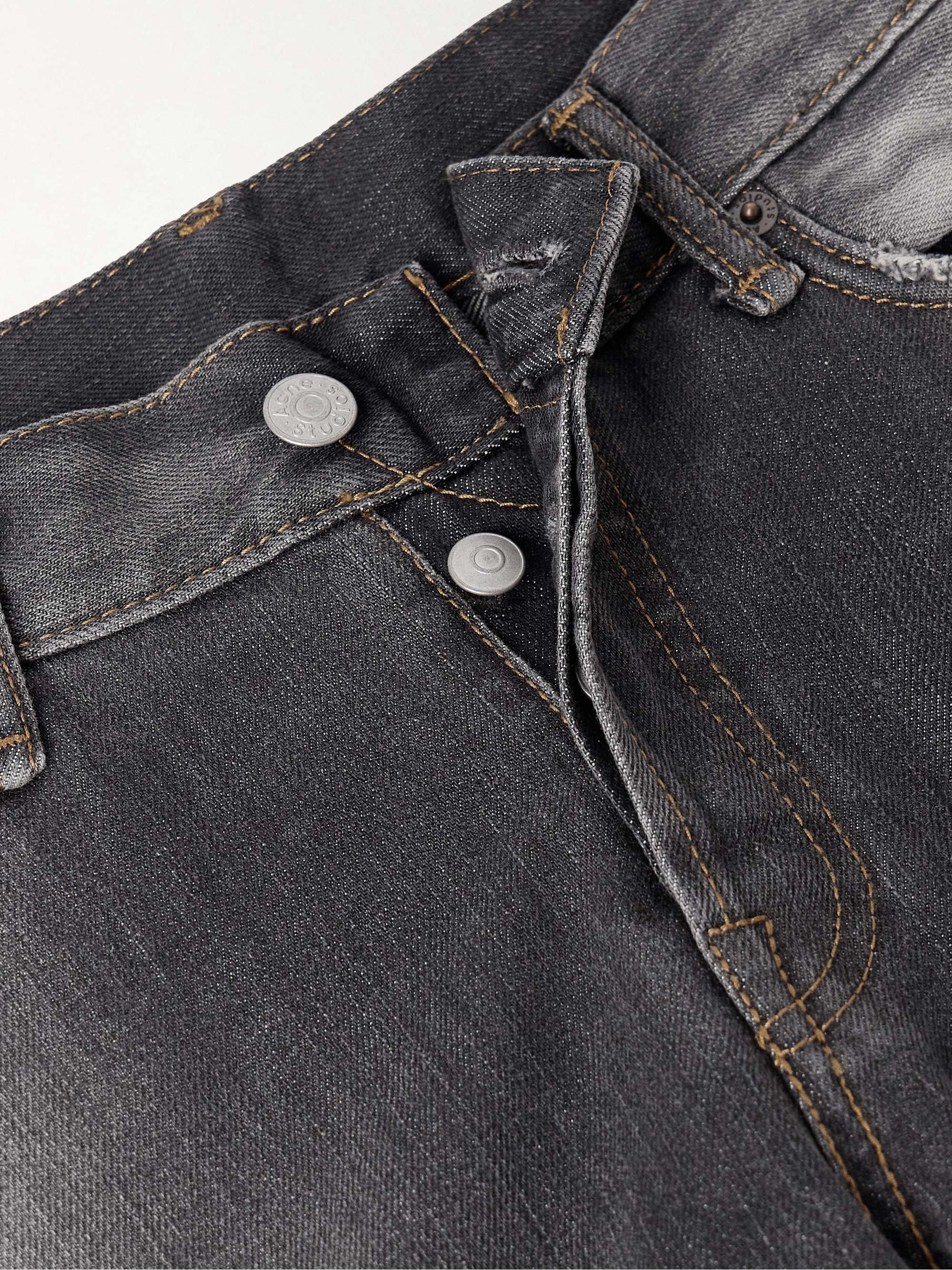 2006 paint-splattered low-rise barrel-leg jeans view