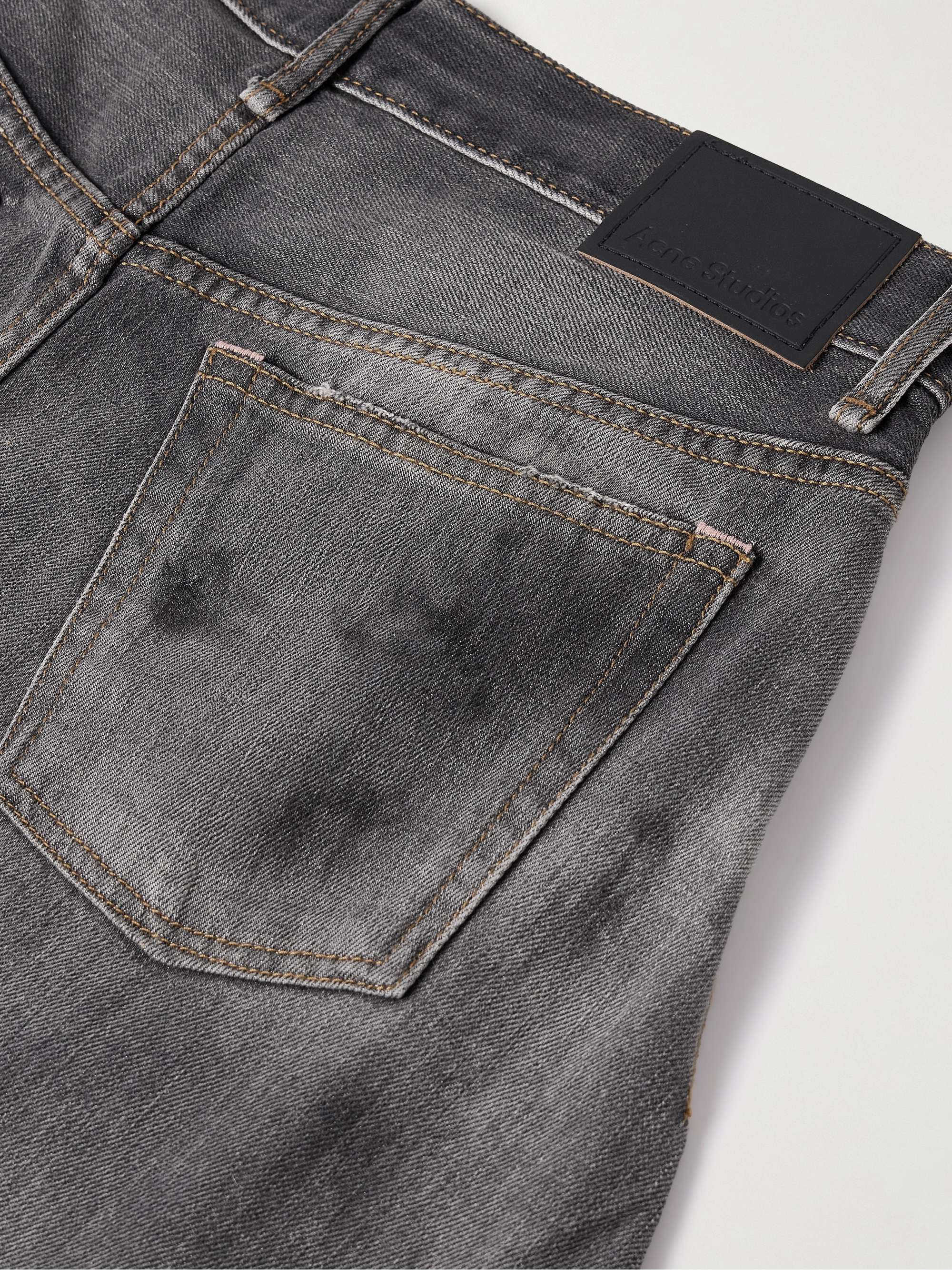 2006 paint-splattered low-rise barrel-leg jeans view