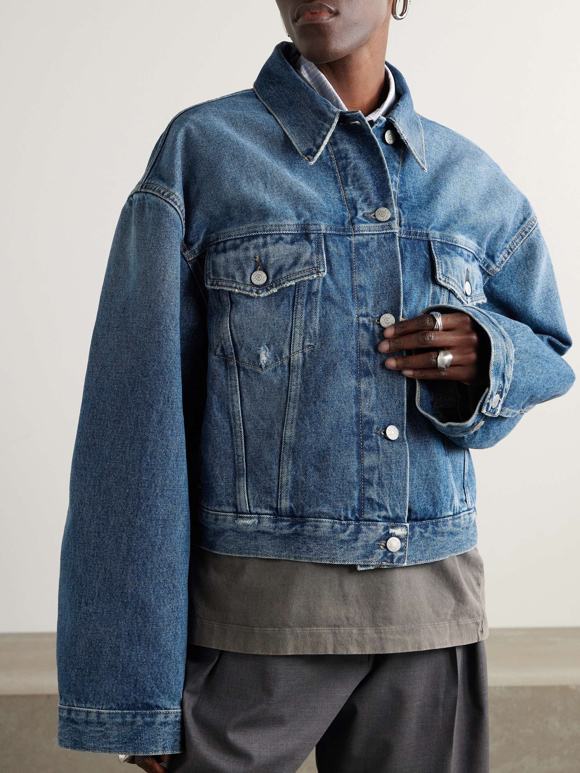 Distressed denim jacket view