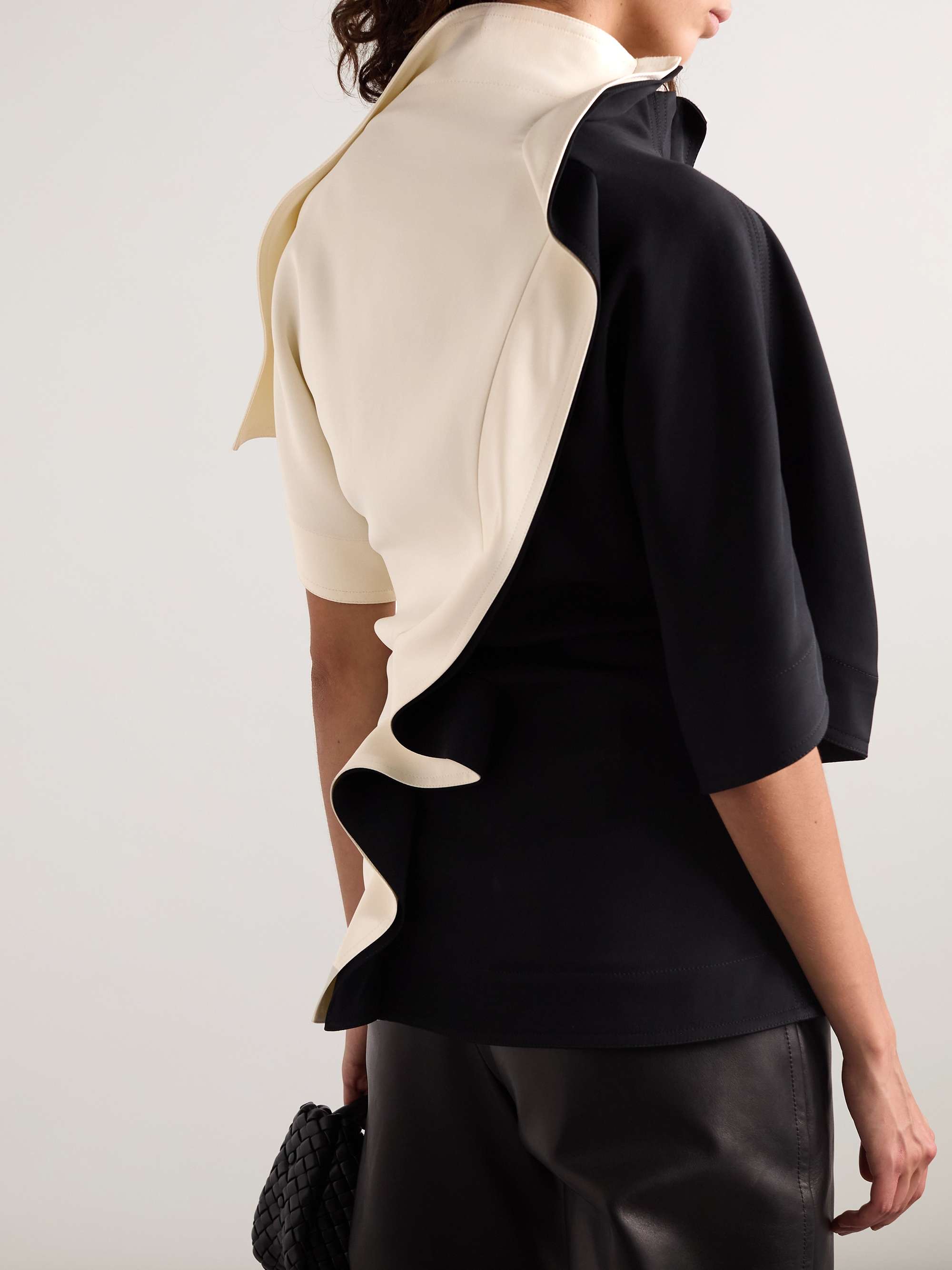 Embellished ruffled draped two-tone crepe top view