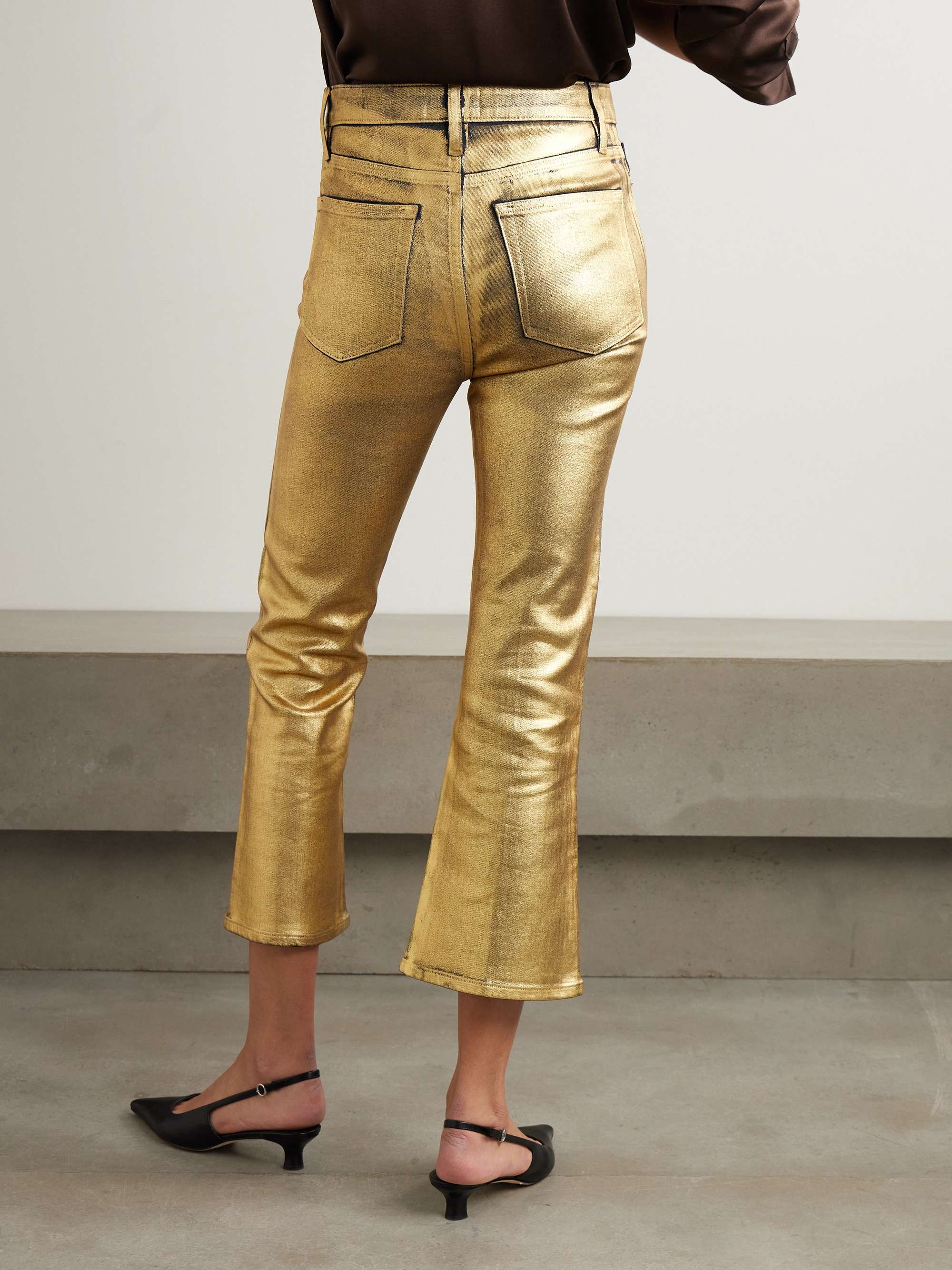 Le Crop Mini cropped metallic coated high-rise bootcut jeans view