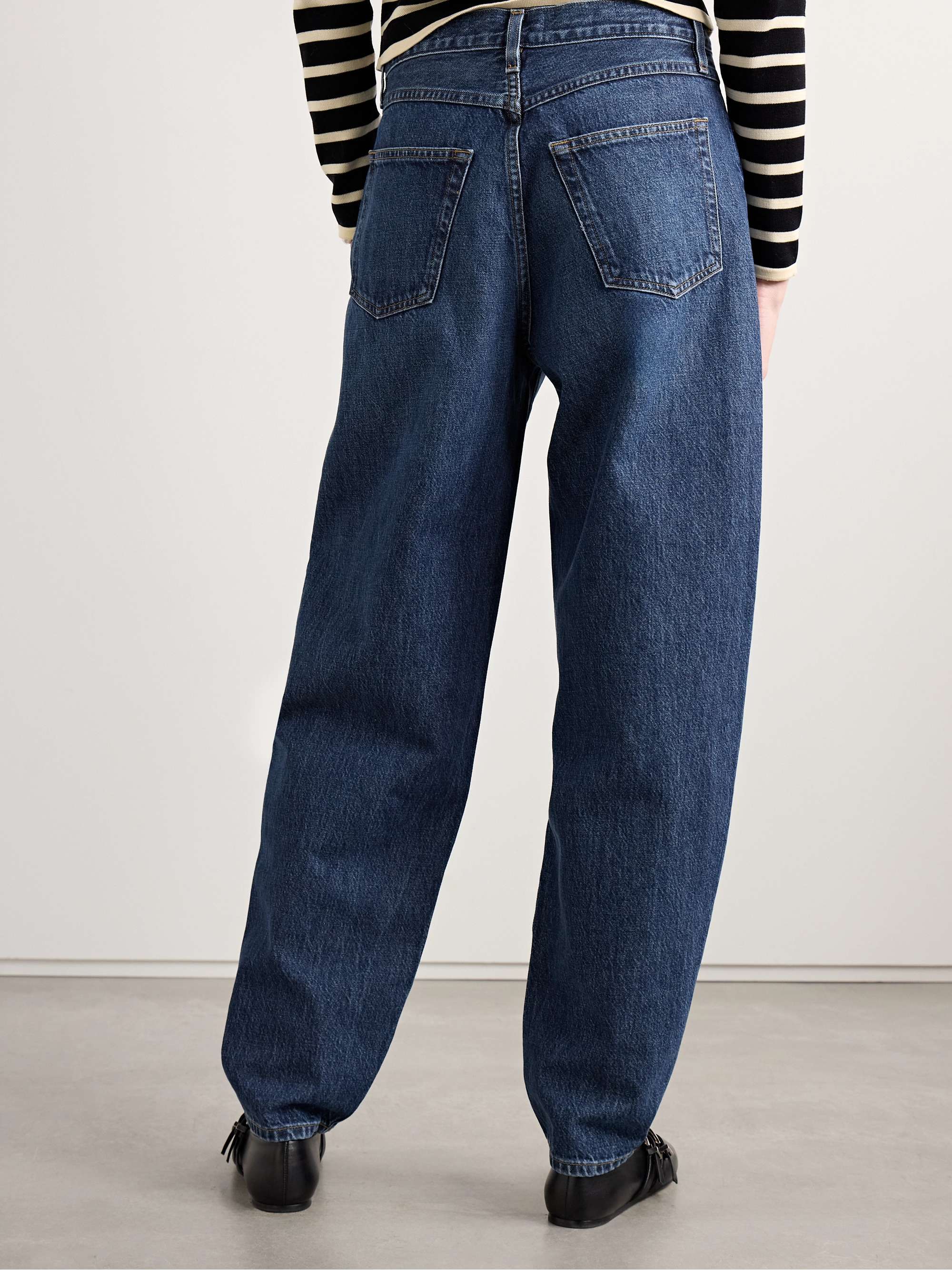 The Narrow high-rise tapered jeans view