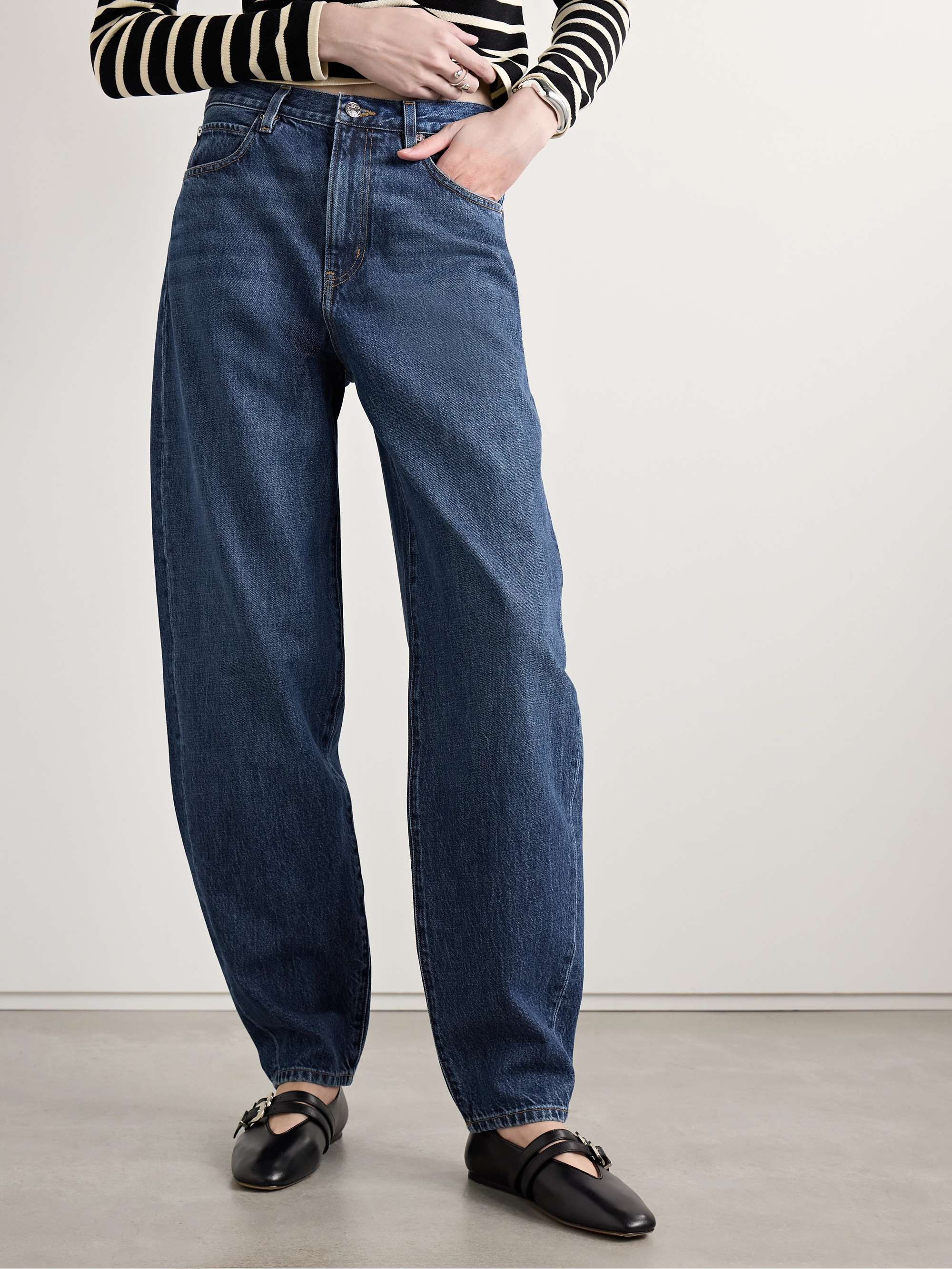 The Narrow high-rise tapered jeans view