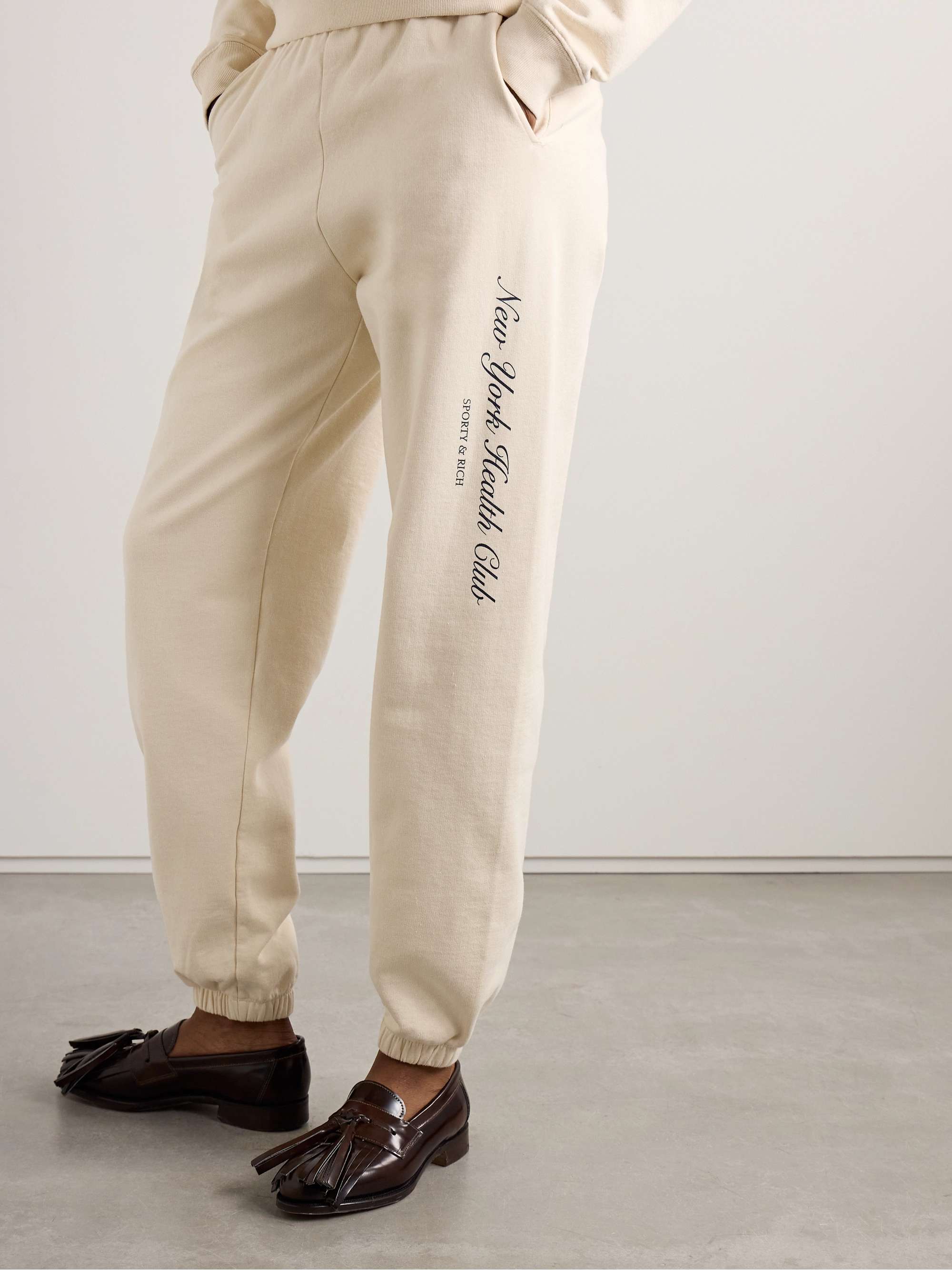 Printed cotton-jersey track pants view