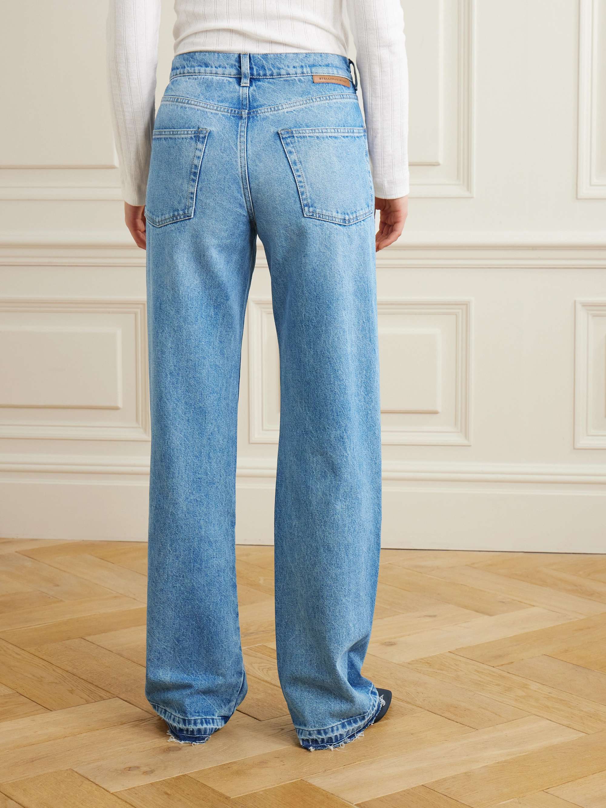 Paneled distressed mid-rise wide-leg jeans view