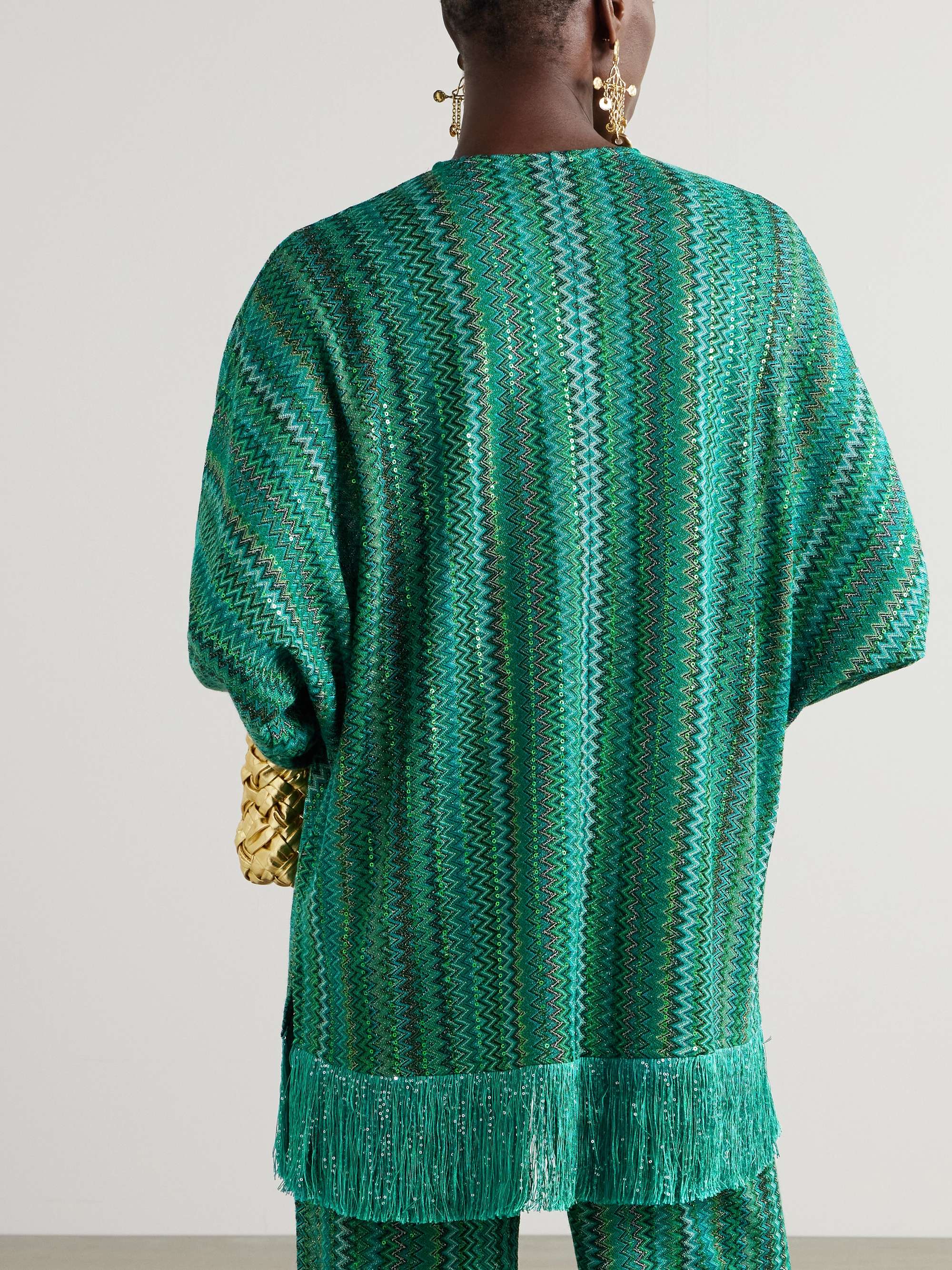 Fringed sequin-embellished metallic crochet-knit top view