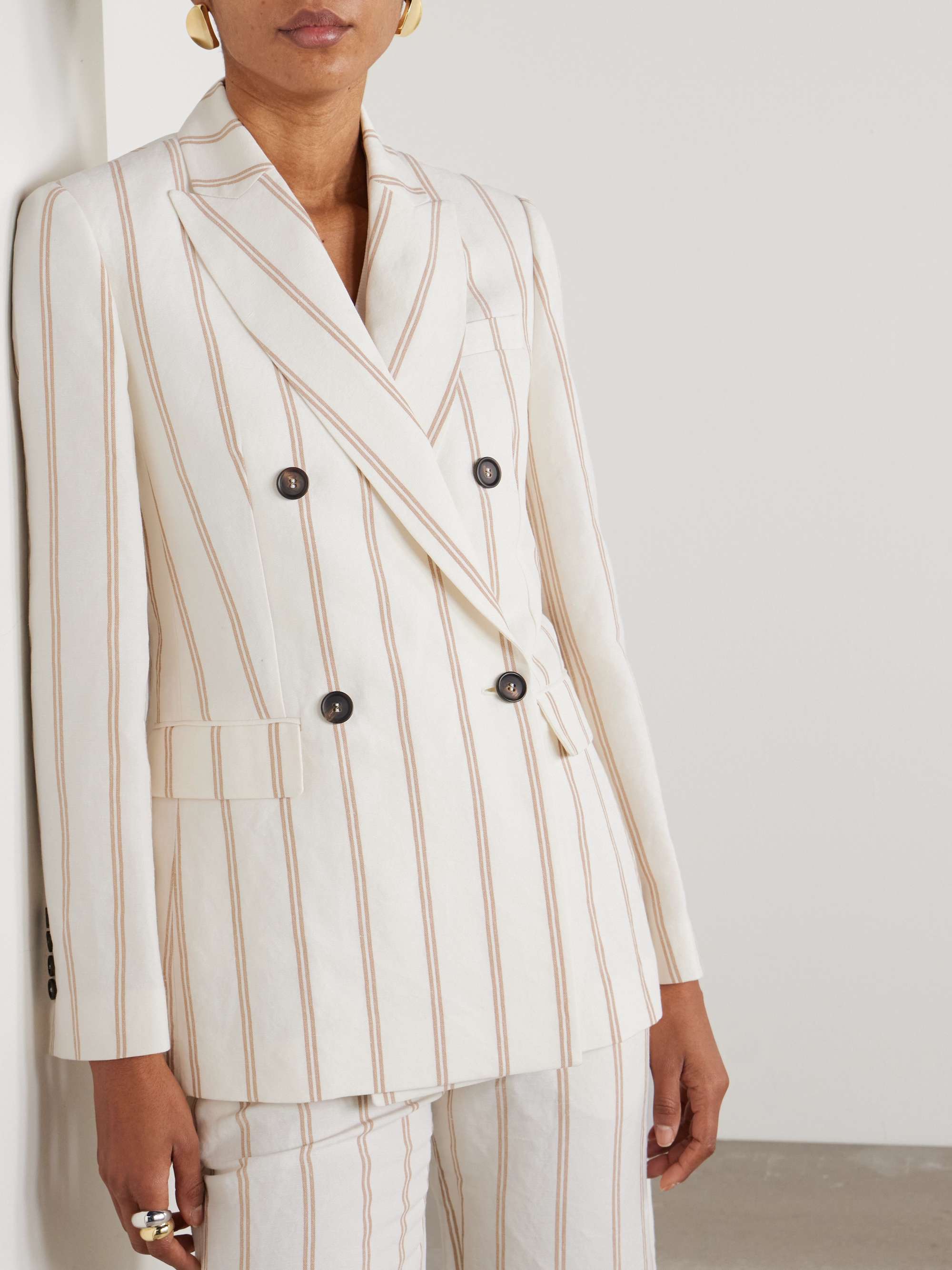 Double-breasted striped linen and cotton-blend blazer view