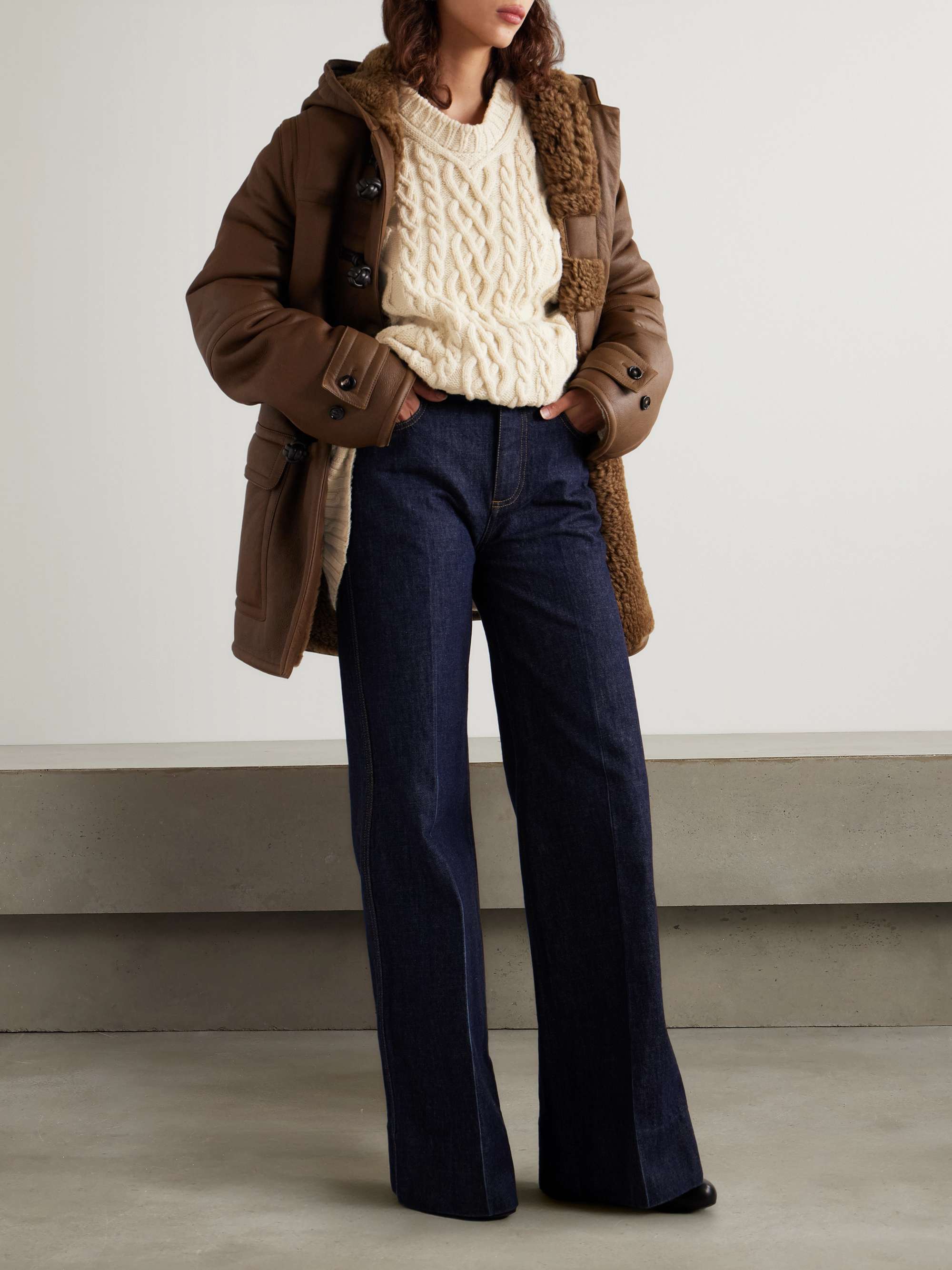 Oversized cable-knit wool sweater view