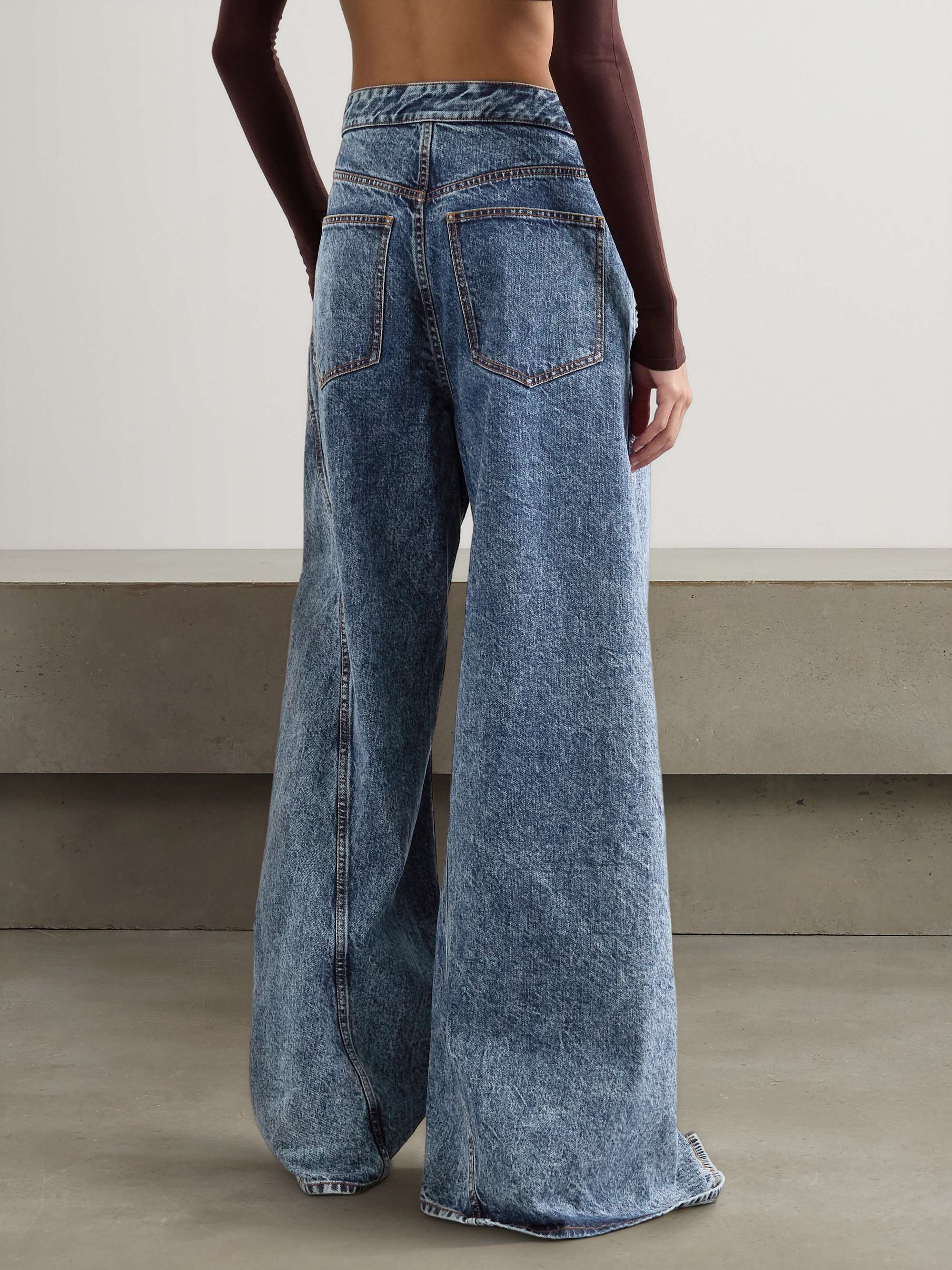 Asymmetric wide-leg jeans view