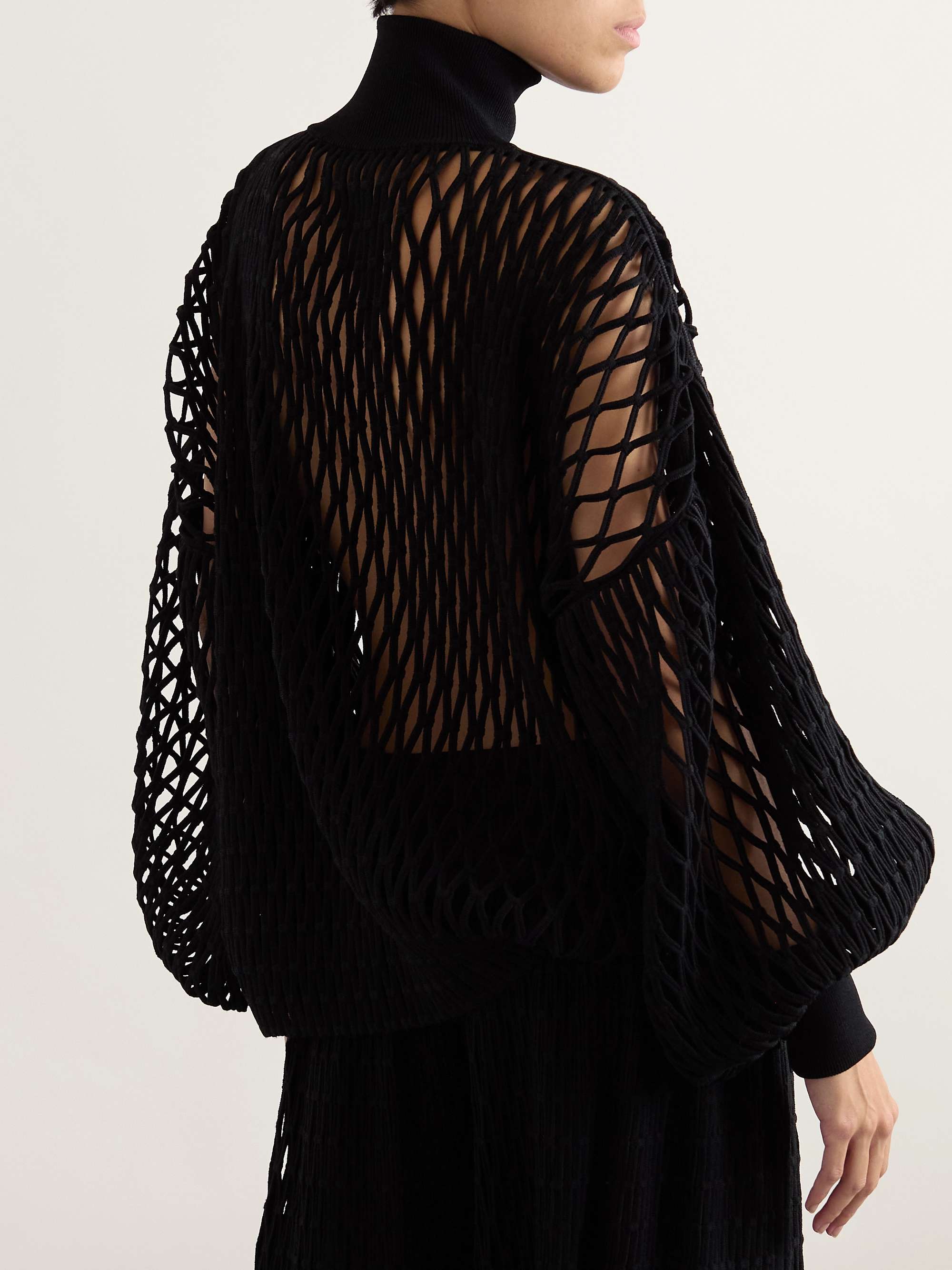 Oversized open-knit turtleneck sweater view