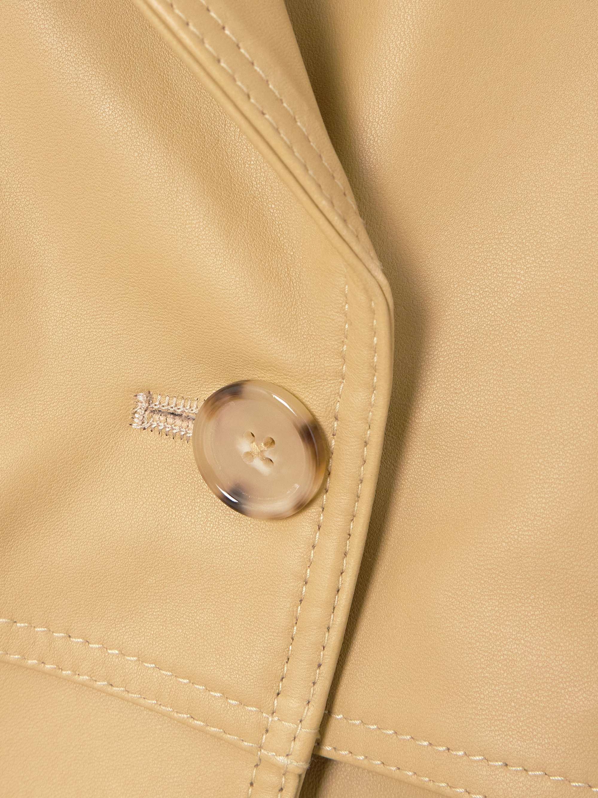 Double-breasted belted layered leather jacket view