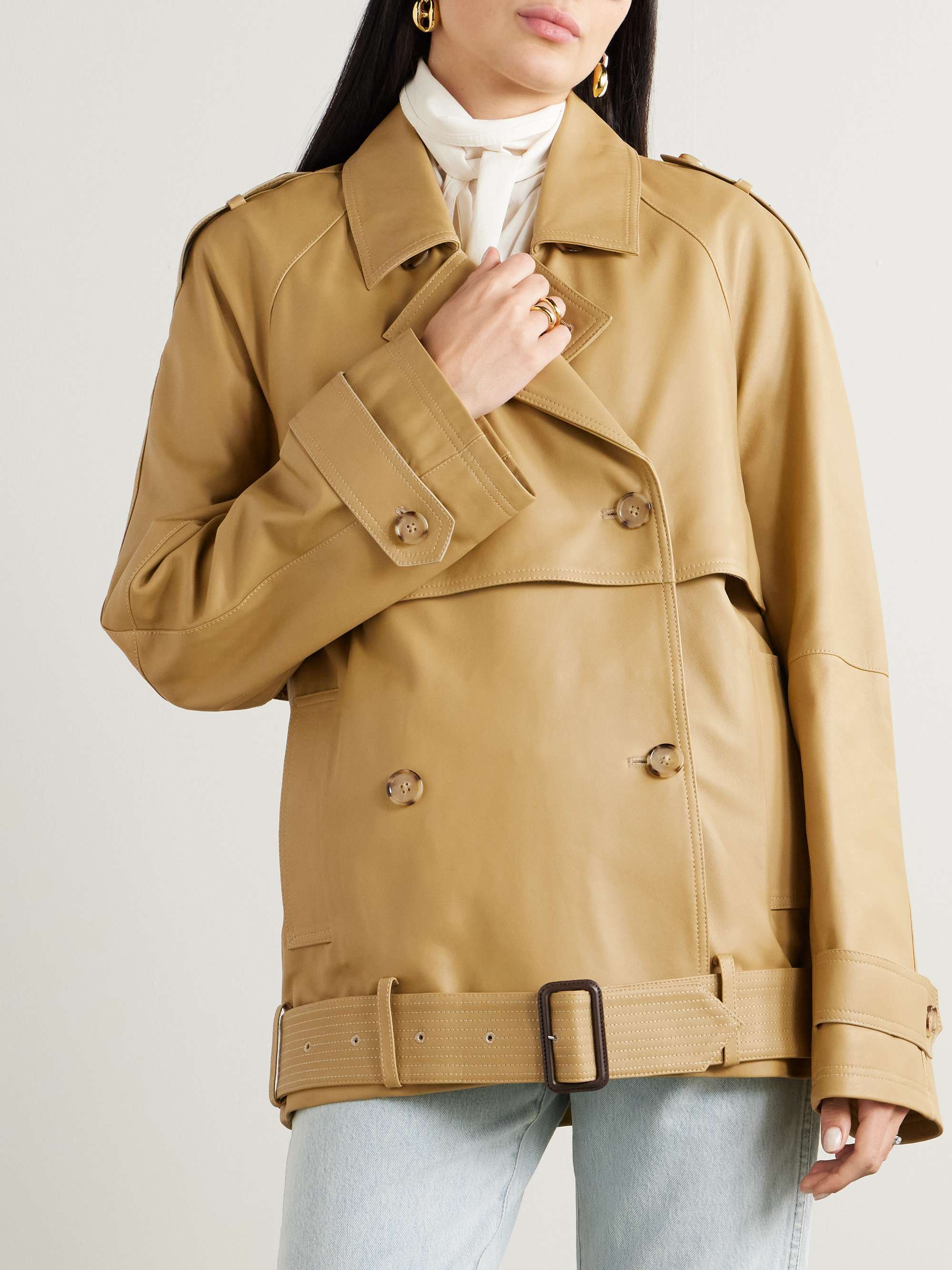 Double-breasted belted layered leather jacket view