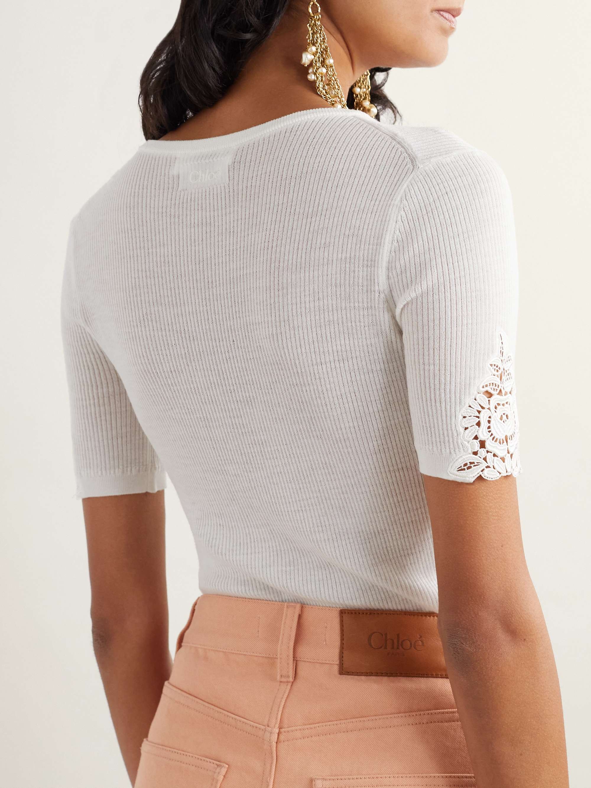 Lace-trimmed ribbed wool top view
