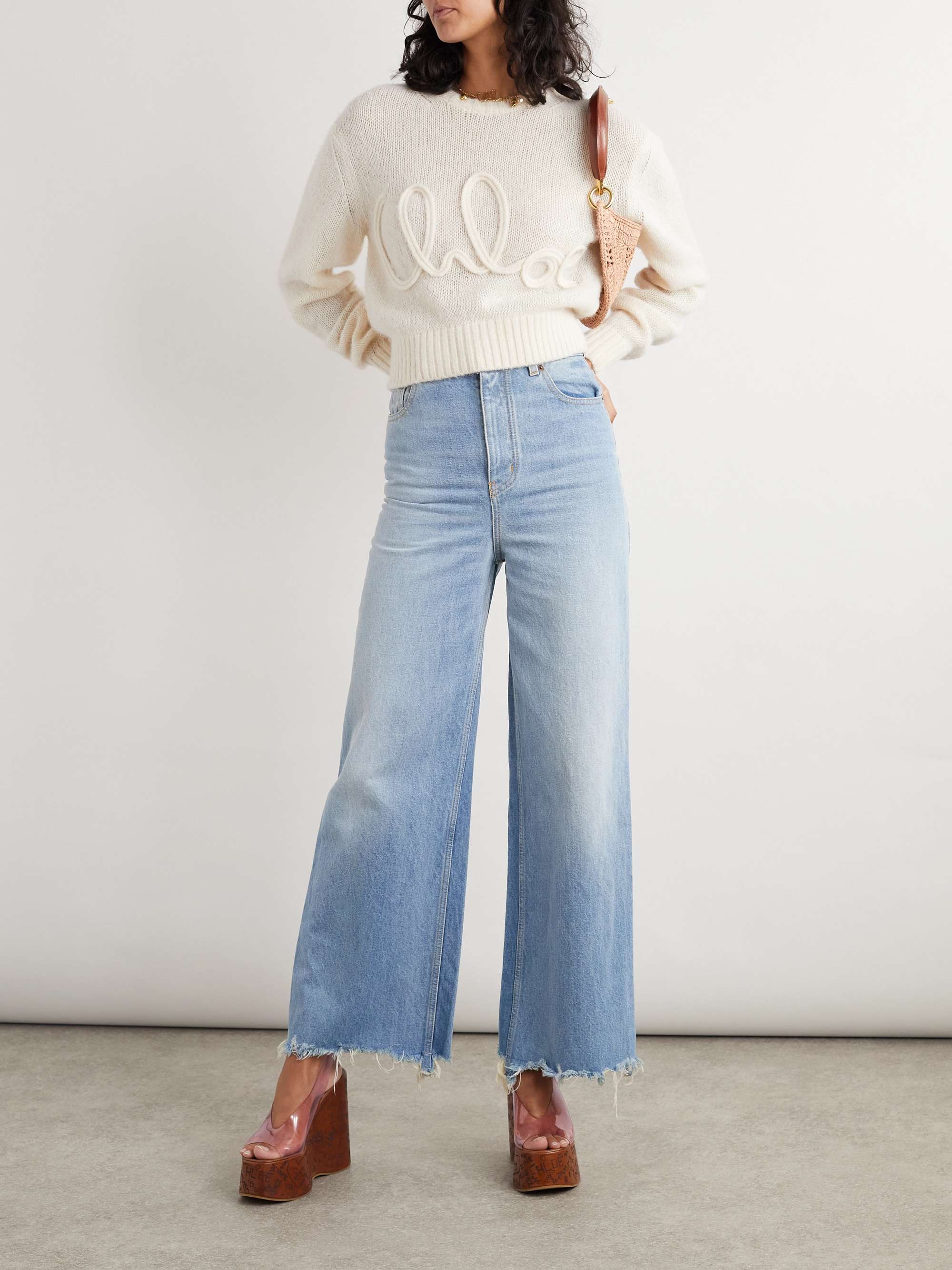 Frayed high-rise wide-leg jeans view