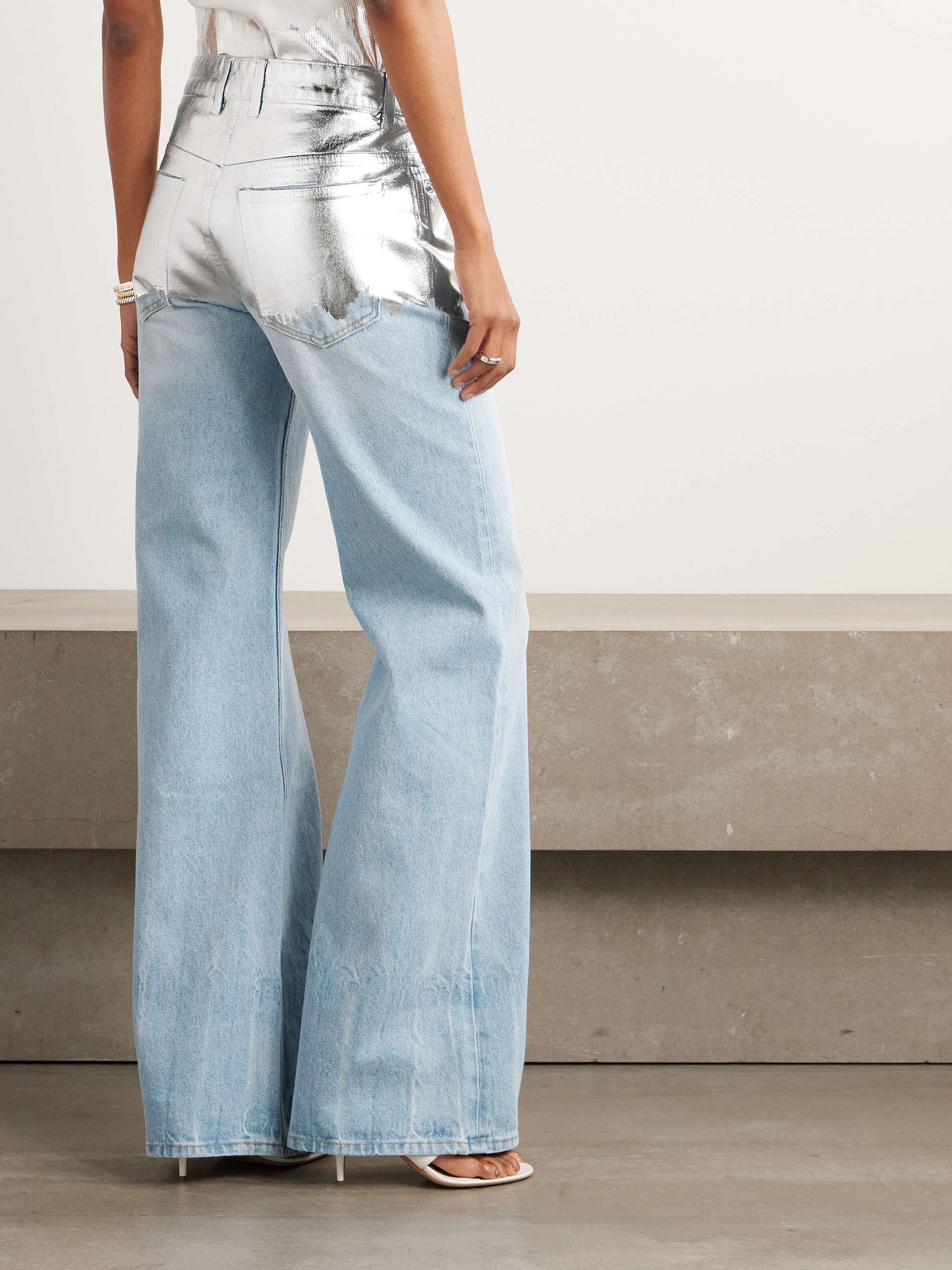 Metallic coated jeans view