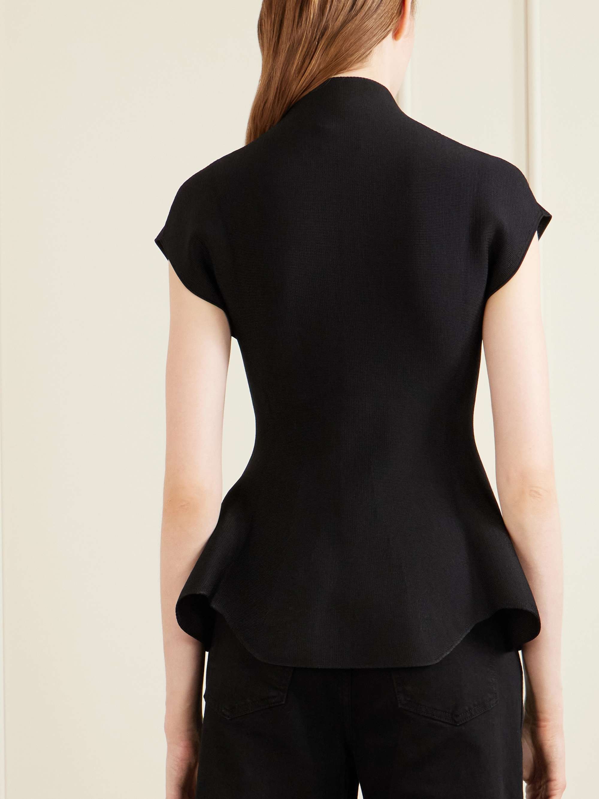 Andra stretch-knit turtleneck peplum top view