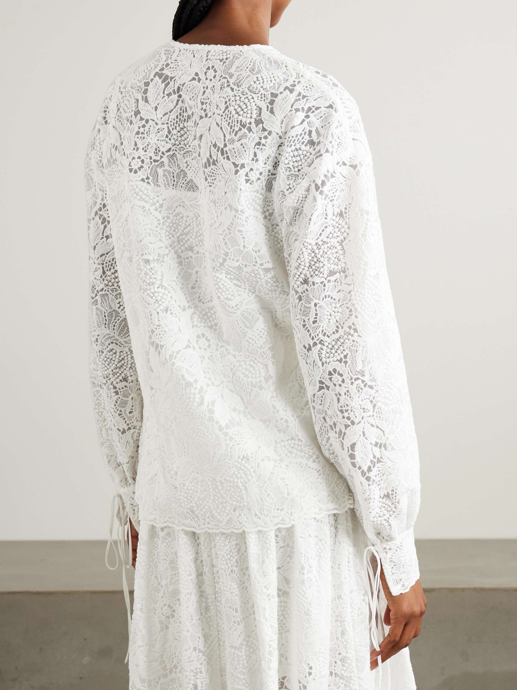 Tie-neck cotton-lace blouse view