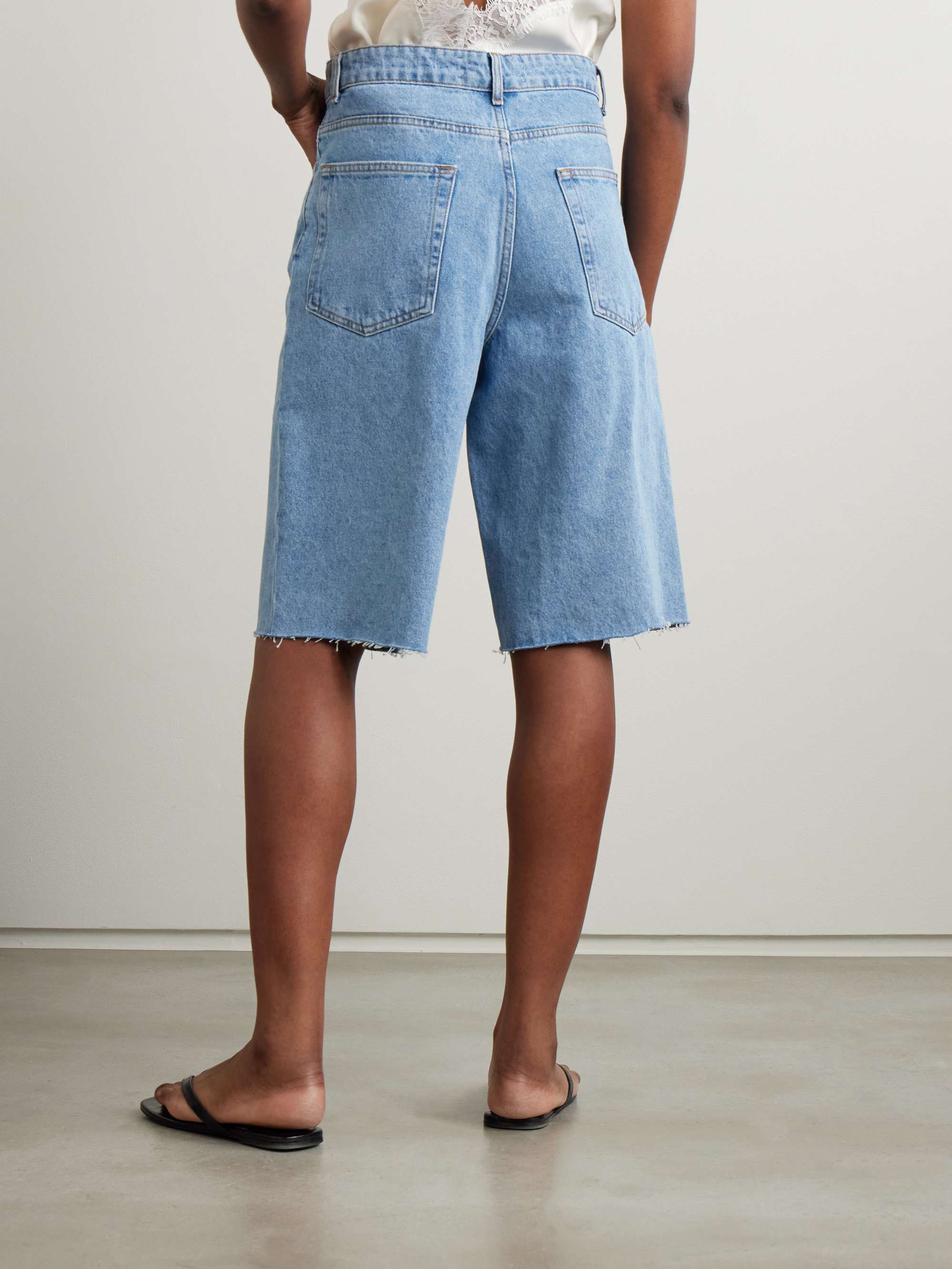 Frayed denim shorts view