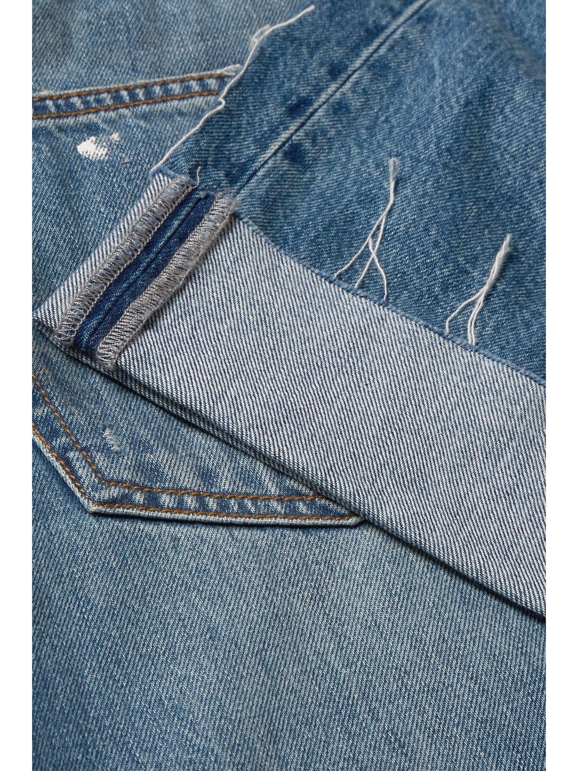Crossover asymmetric distressed high-rise wide-leg jeans view