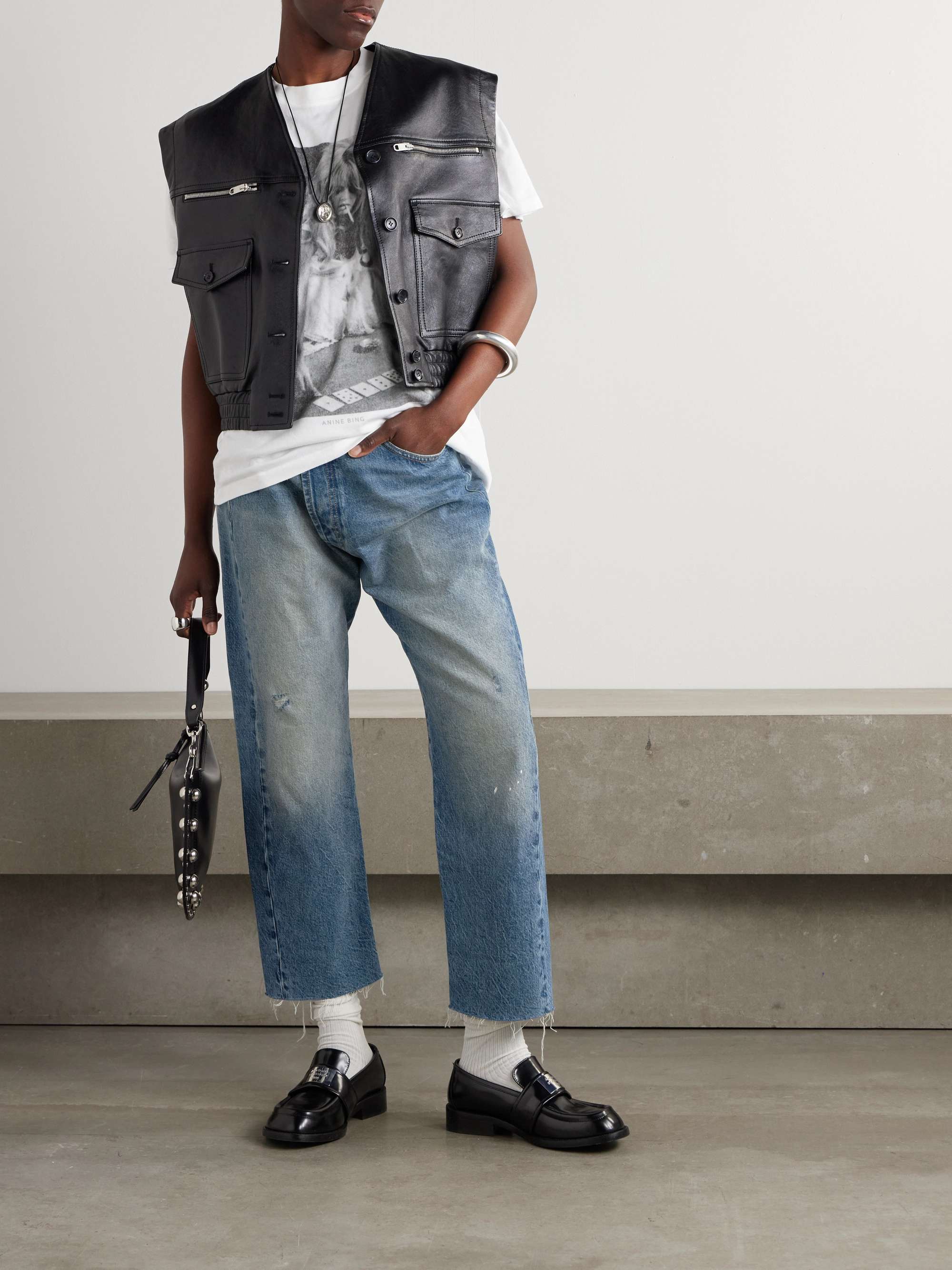 Crossover asymmetric distressed high-rise wide-leg jeans view