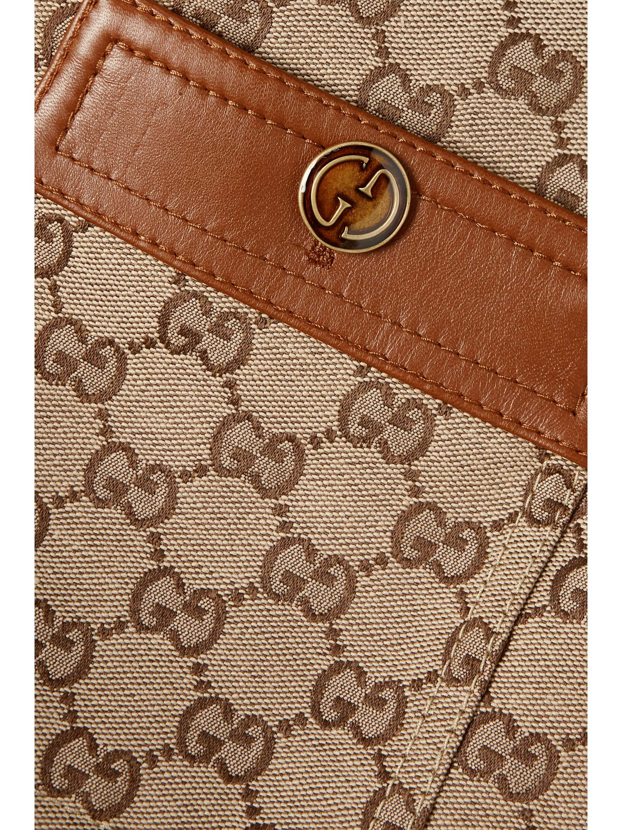 Belted leather-trimmed cotton-blend canvas-jacquard jacket view