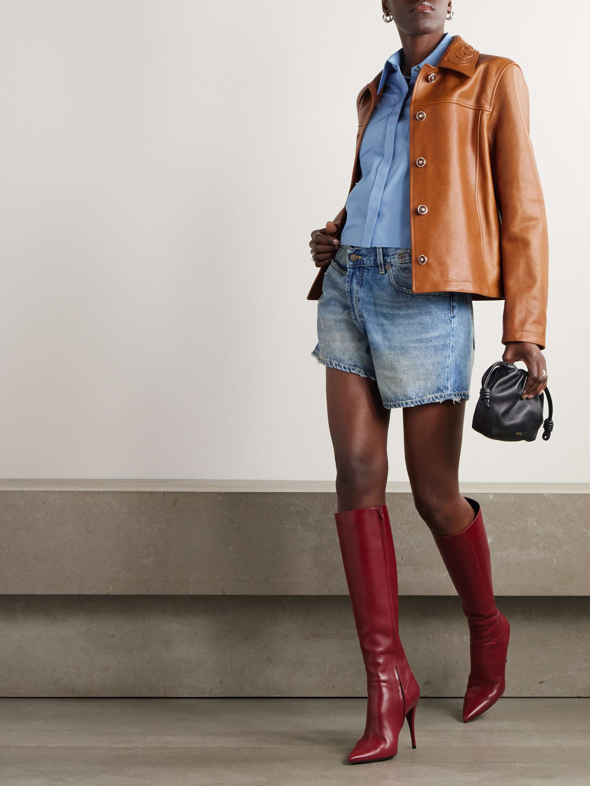 Debossed paneled textured-leather jacket view