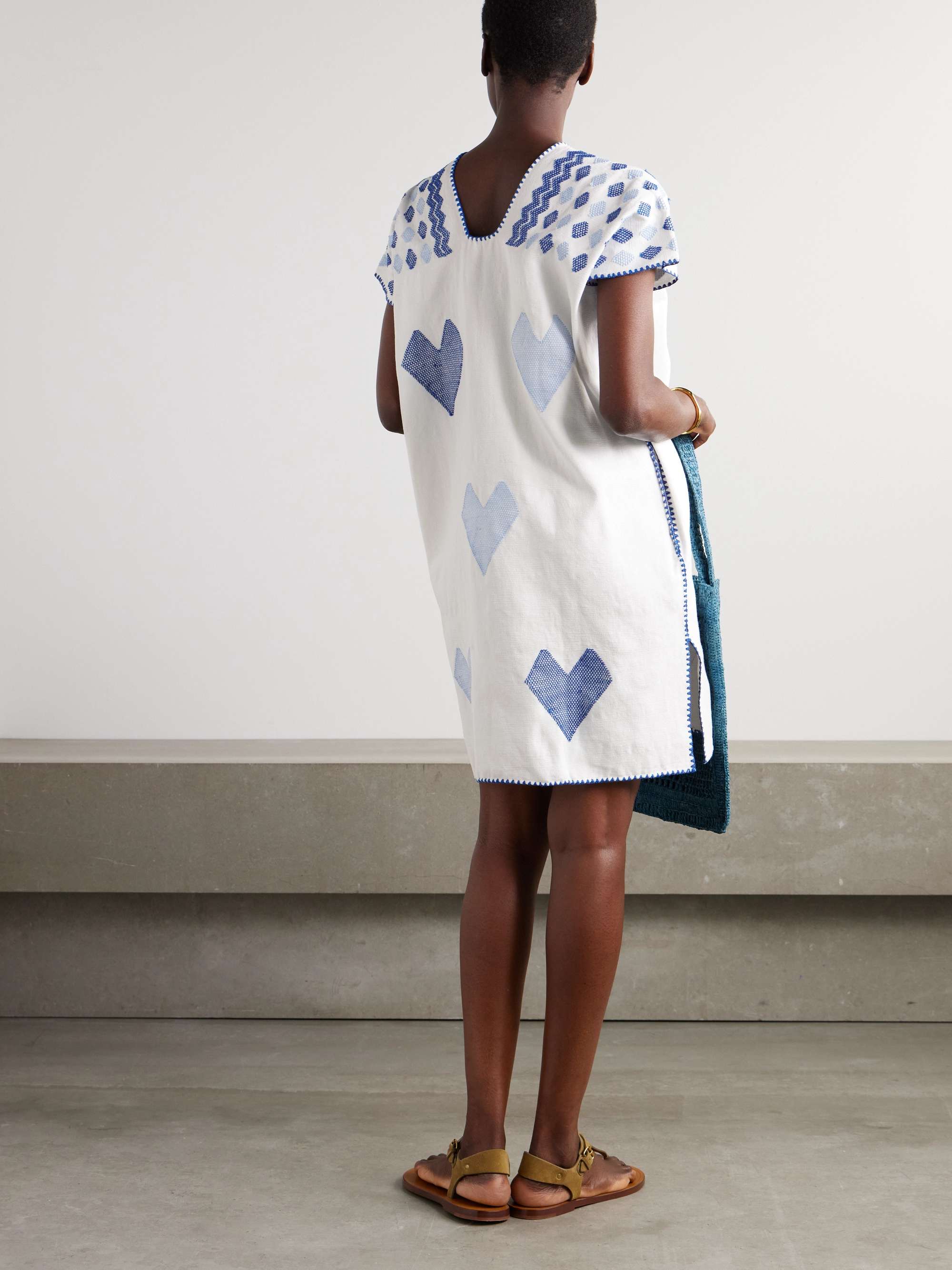 Embroidered cotton huipil view