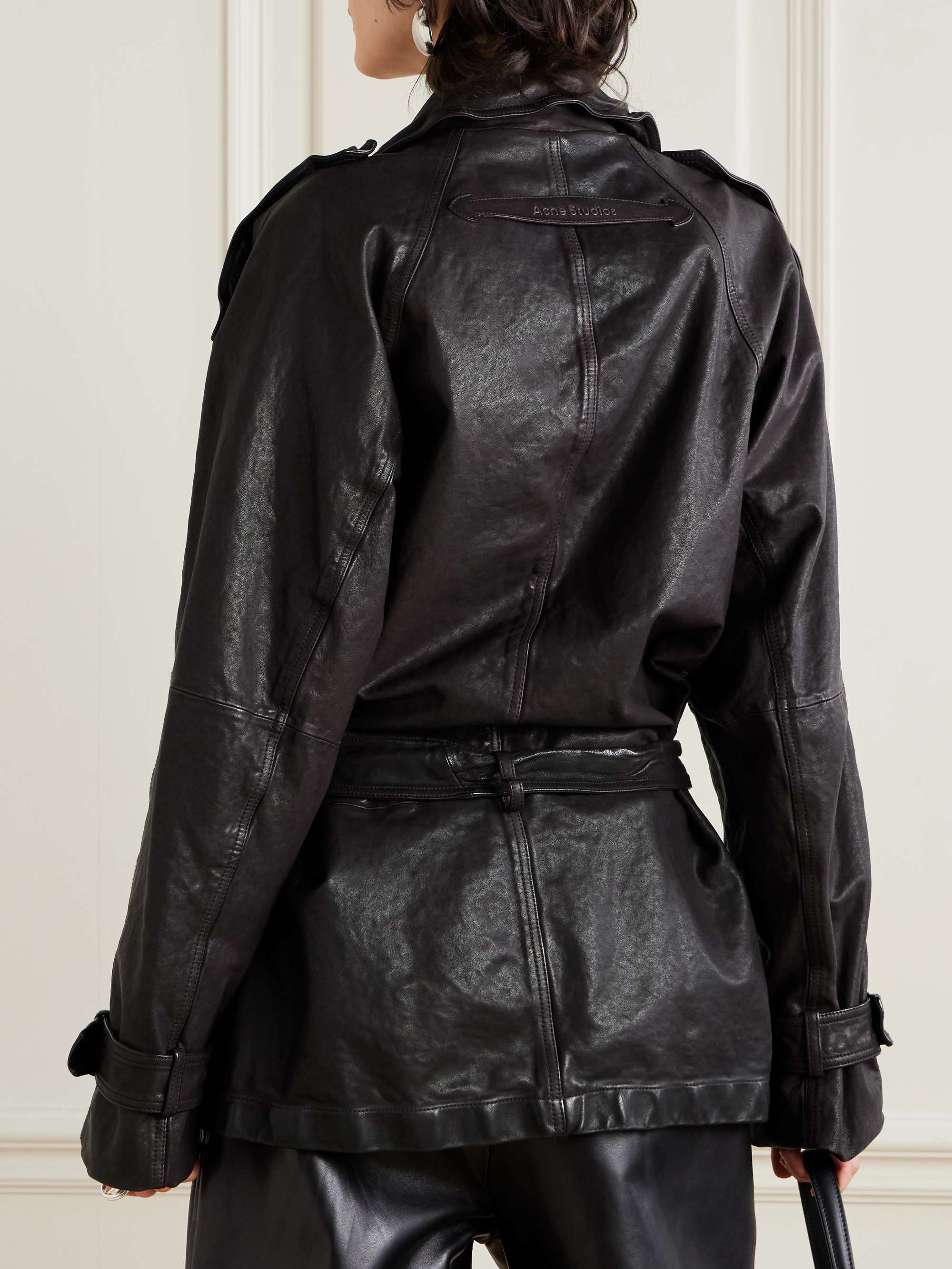 Double-breasted belted leather jacket view