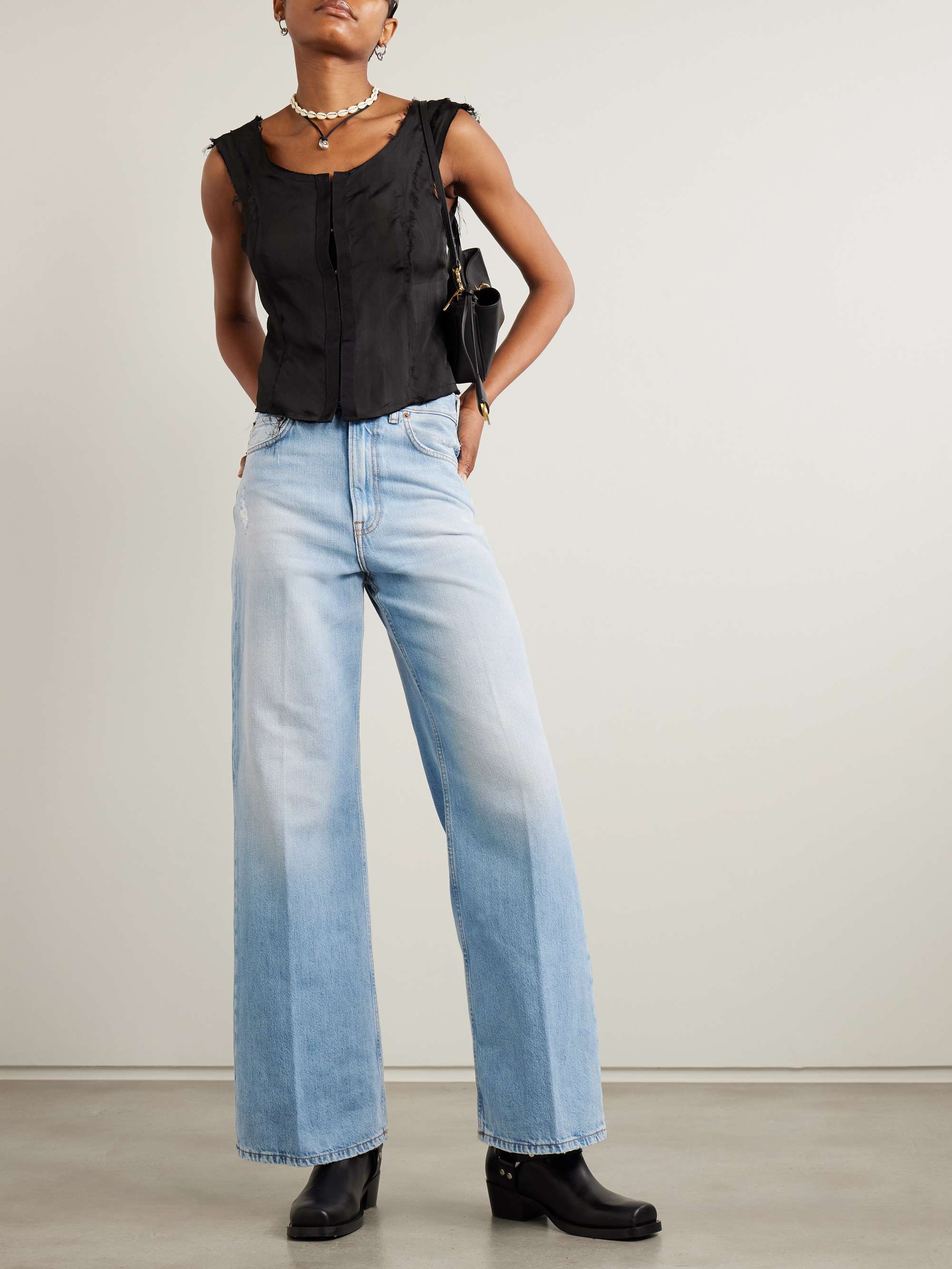 Distressed high-rise wide-leg organic jeans view